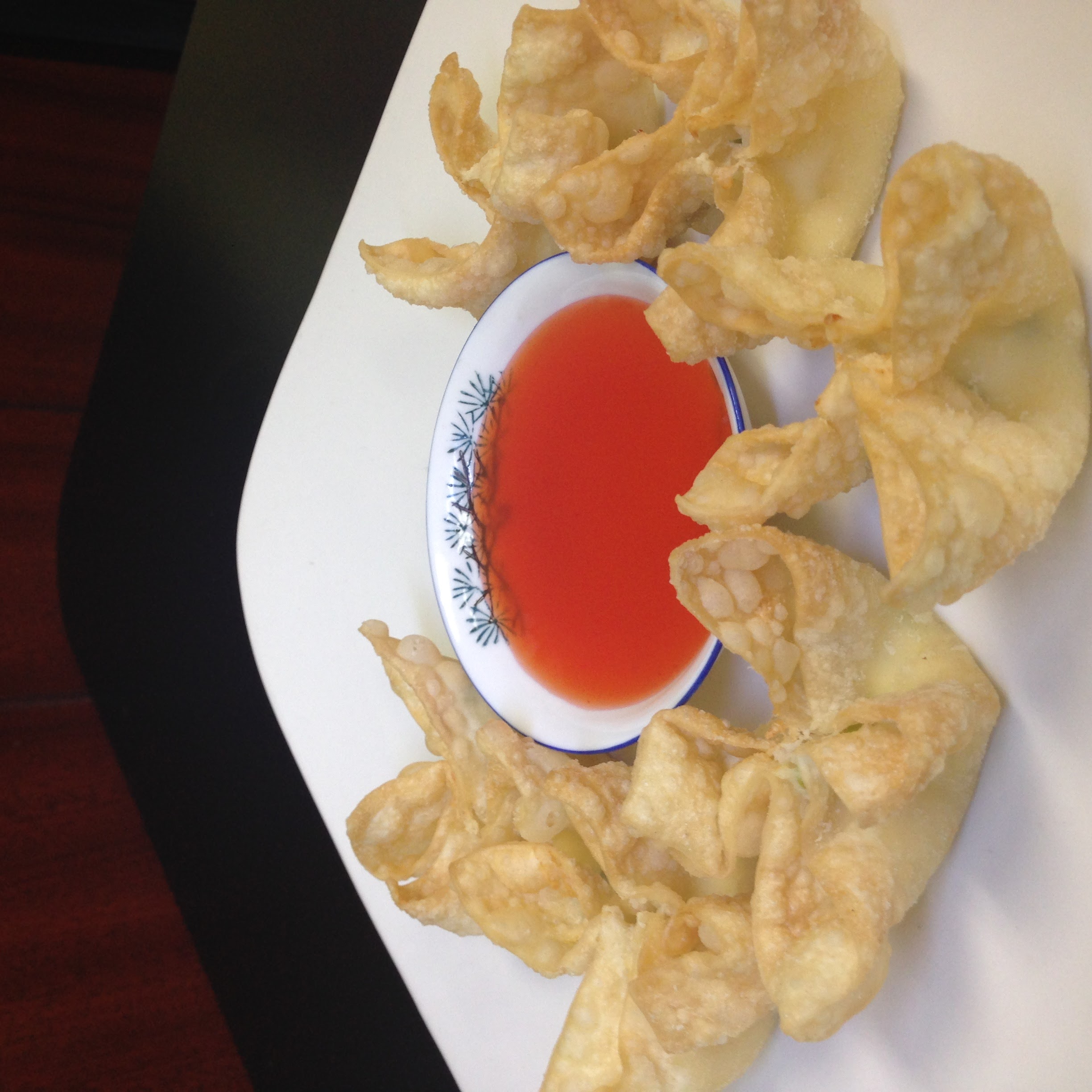Order 6 Crab Cheese Wontons food online from Cao's Kitchen Asian Bistro store, Orange on bringmethat.com