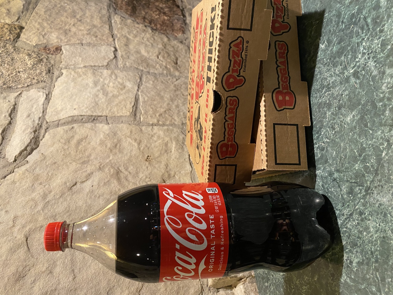 Order Coke 2Liter food online from Beggars Pizza store, Gary on bringmethat.com
