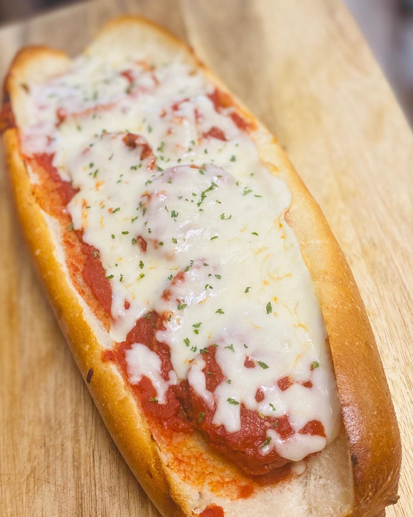 Order Meatball Parm Sandwich - 12" food online from Affamato Pizza & Italian Restaurant store, Norristown on bringmethat.com