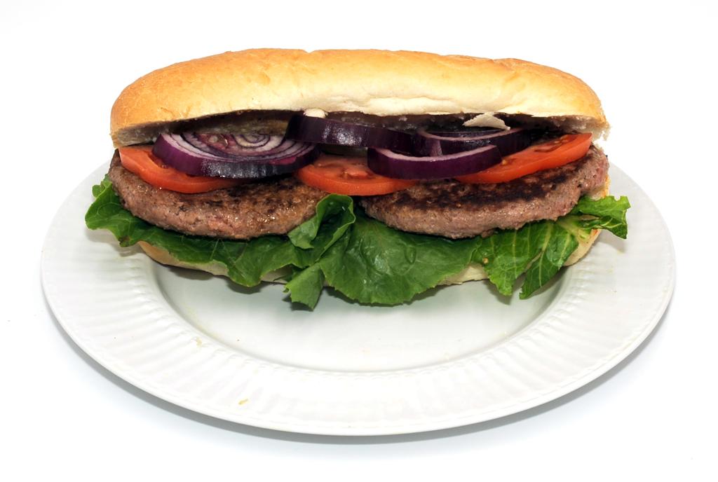 Order Veggie Burger food online from Pizza Movers & Calzones store, Washington on bringmethat.com