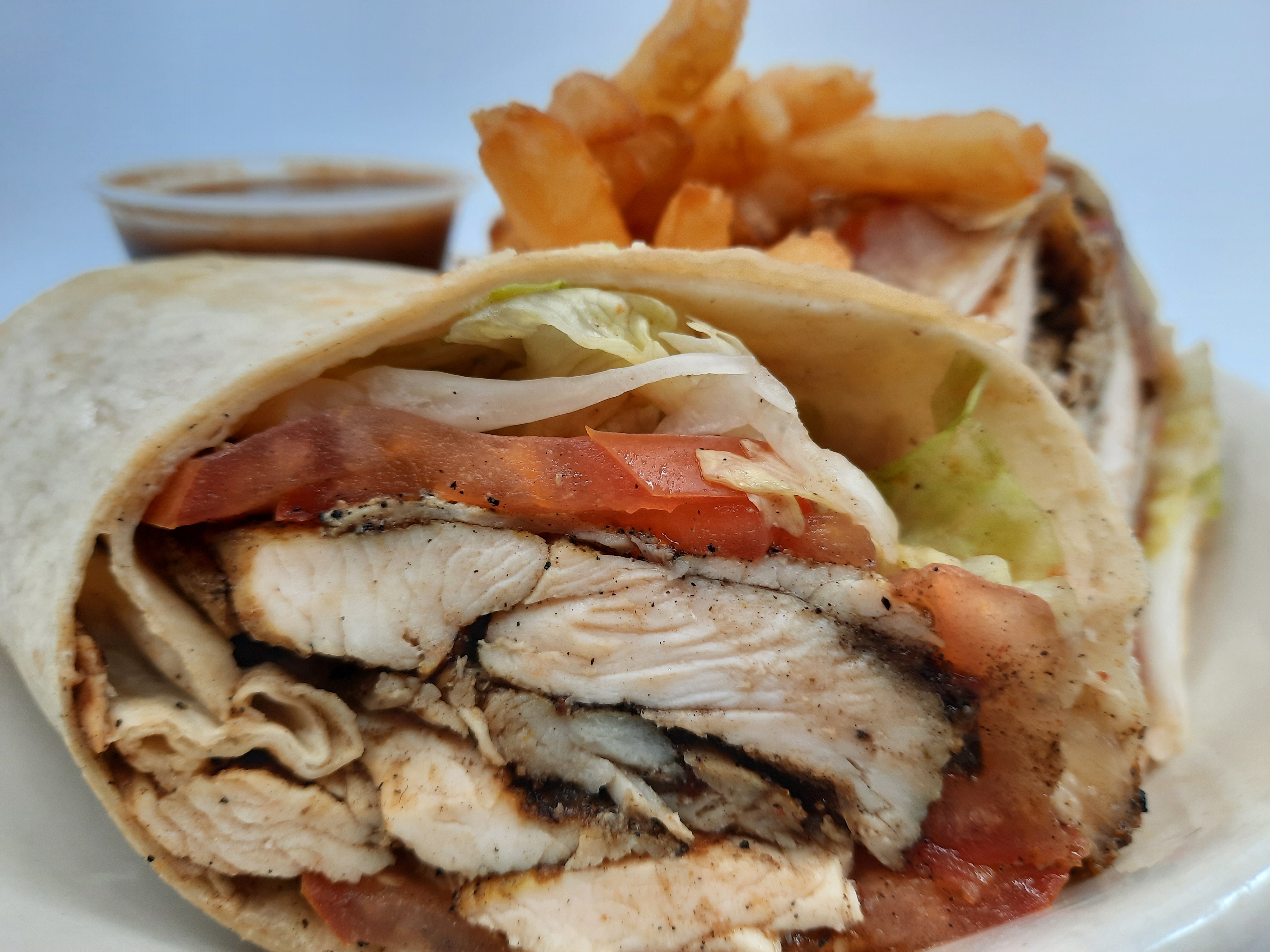Order Jerk Chicken Wrap & Fries food online from Country Kitchen store, New Rochelle on bringmethat.com