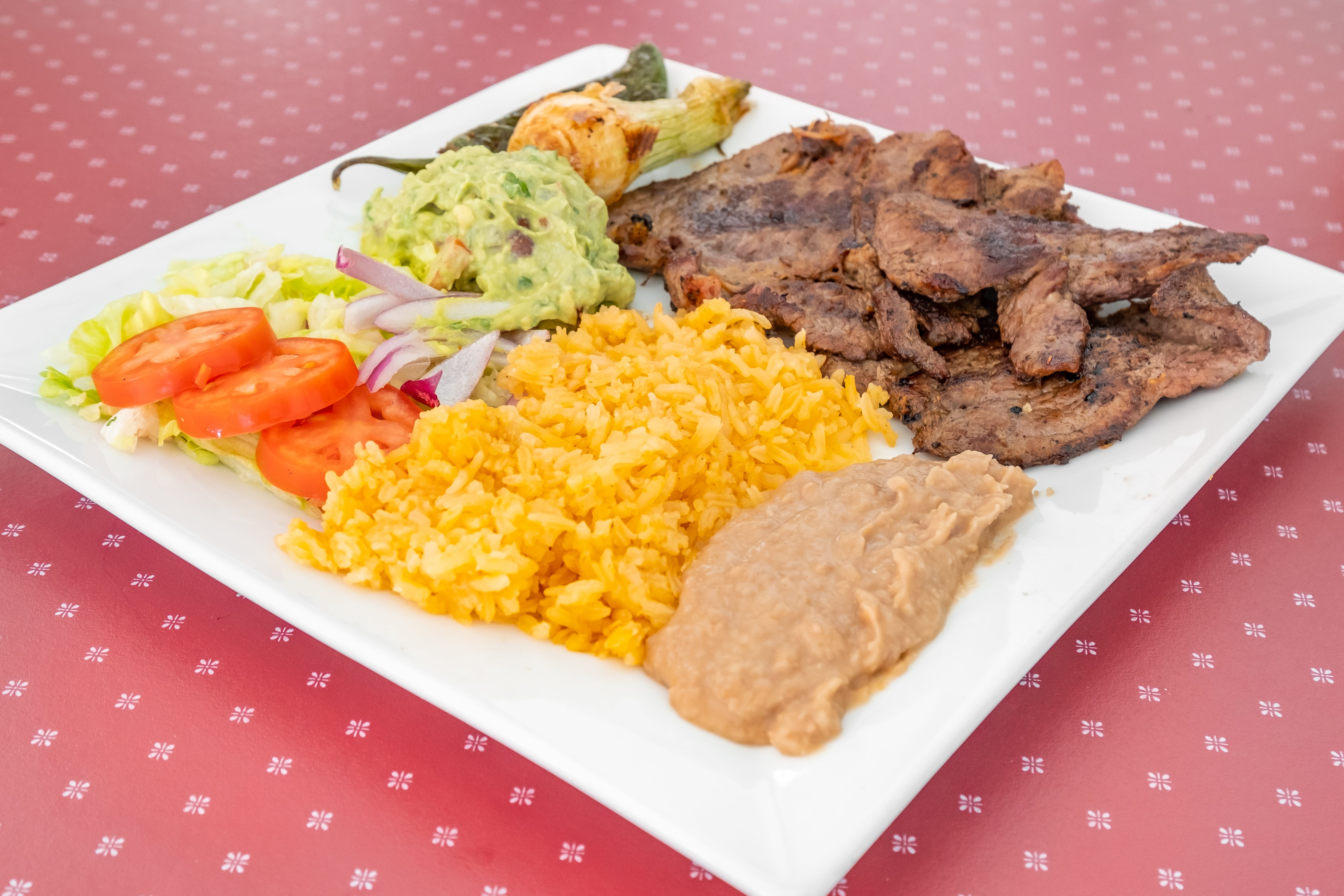 Order Carne Asada - Platos food online from Tacos Los Primos store, Chambersburg on bringmethat.com