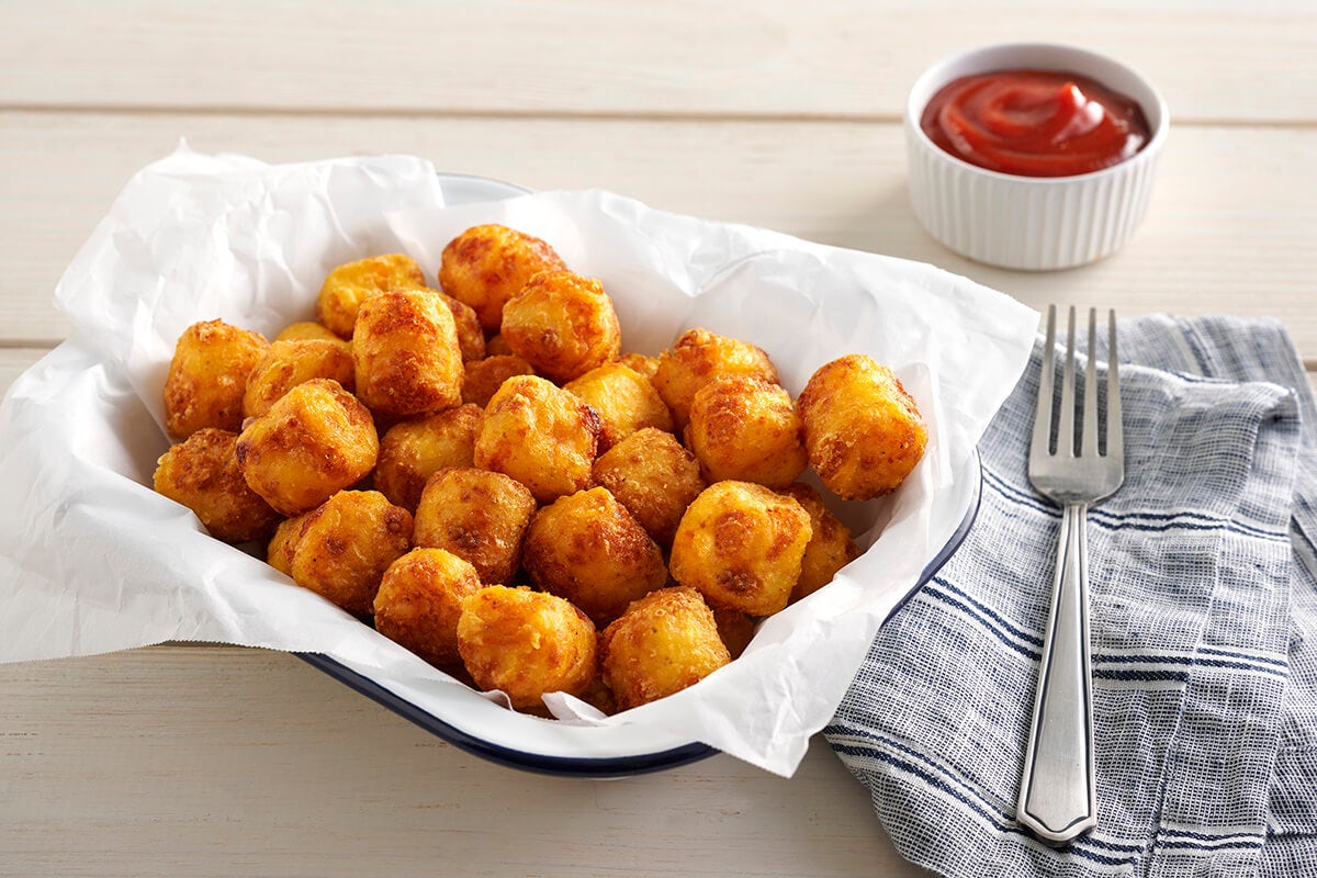Order Hashbrown Casserole Tots food online from Cracker Barrel Old Country Store store, Adairsville on bringmethat.com