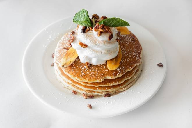 Order Banana Fosters Pancakes food online from The Hash Kitchen store, Scottsdale on bringmethat.com