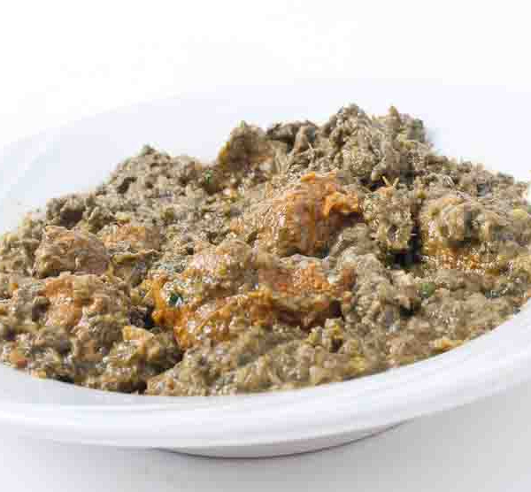 Order Lamb Saag food online from Priya Indian Cuisine store, Troy on bringmethat.com