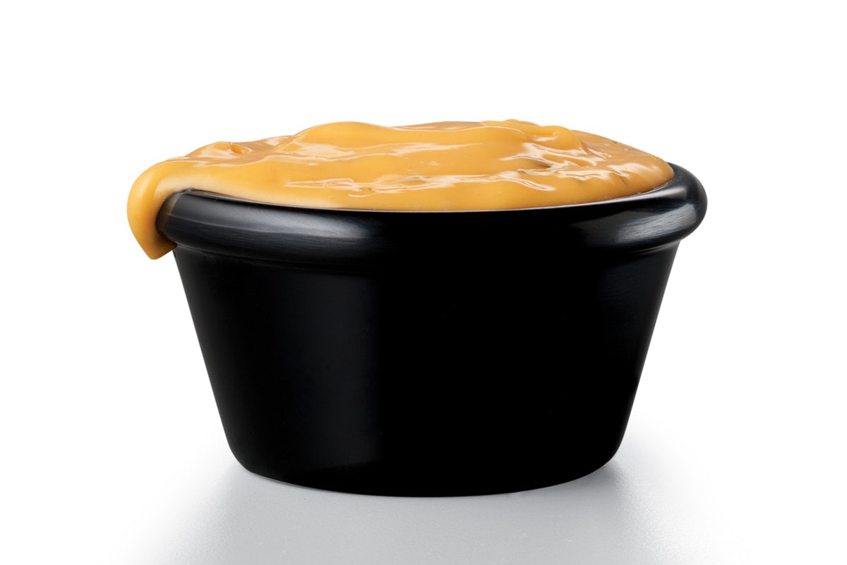 Order Nacho Cheese food online from Taco John's store, Evansville on bringmethat.com