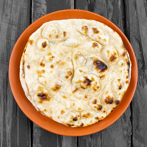 Order Butter Naan food online from Tropical Curry And Grill store, Pflugerville on bringmethat.com