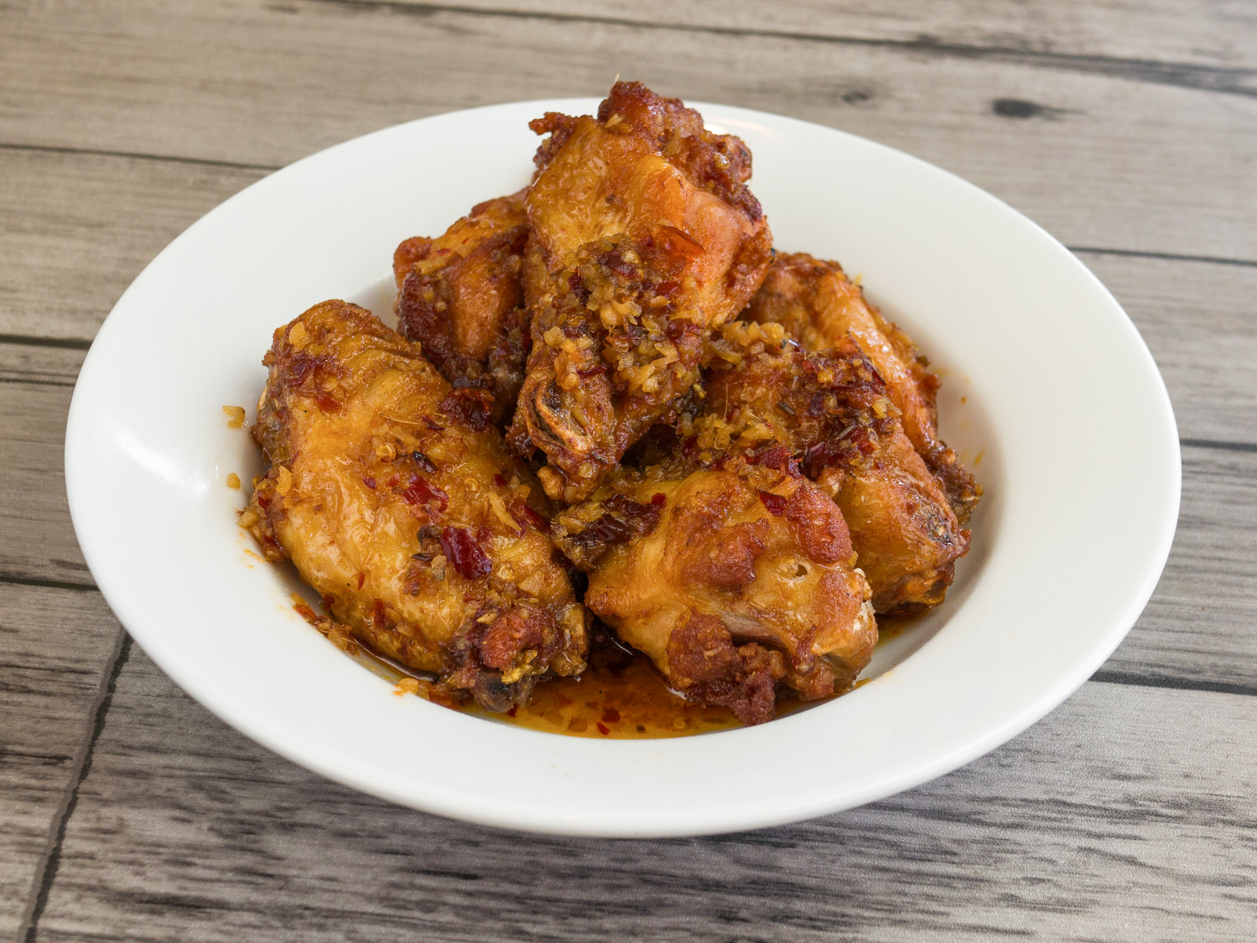 Order A18. Spicy Lemongrass Wings food online from Crazy Wok store, Houston on bringmethat.com