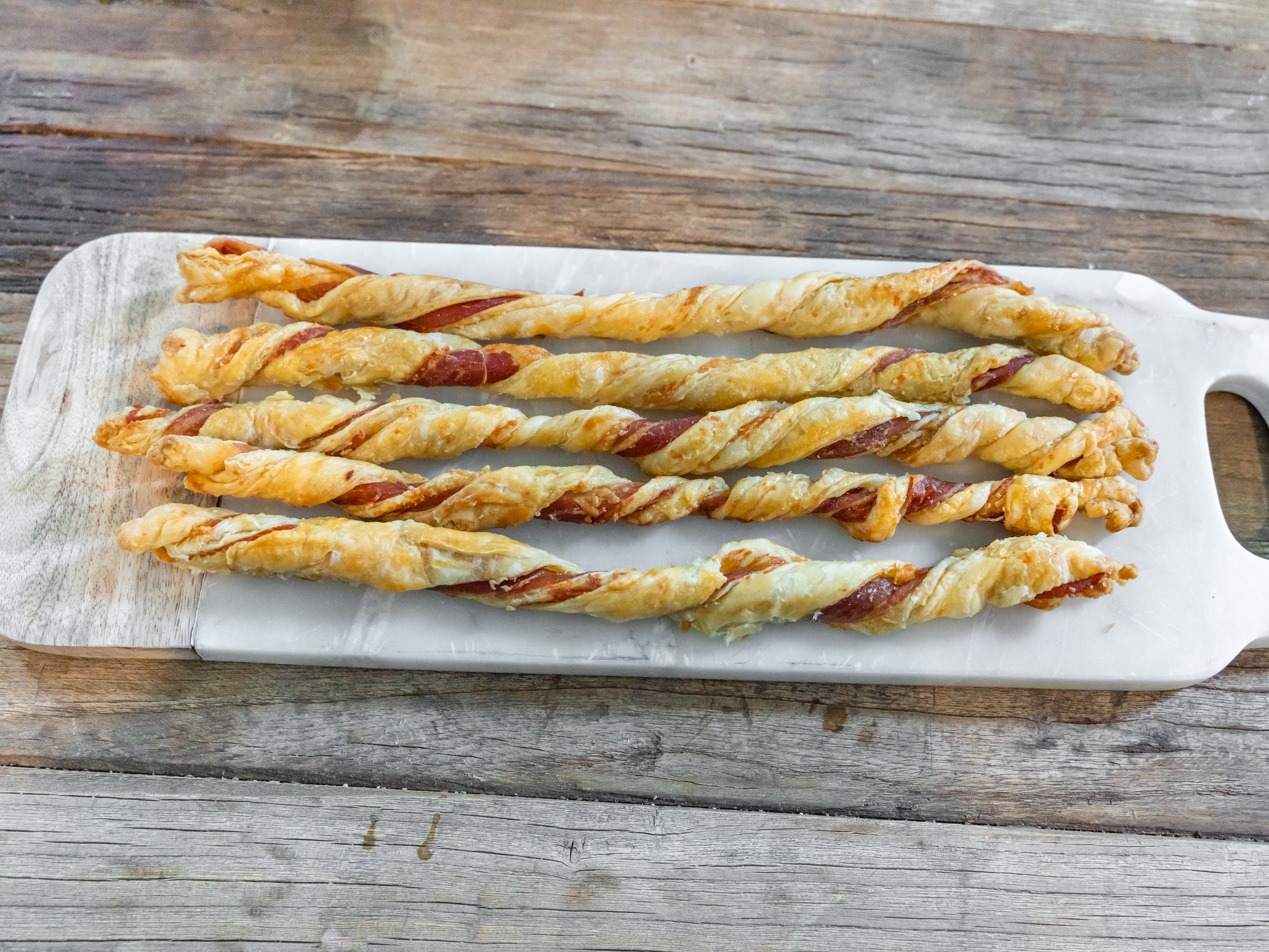 Order Prosciutto & Cheese Twists food online from Reds (Trinidadian Food) store, Austin on bringmethat.com