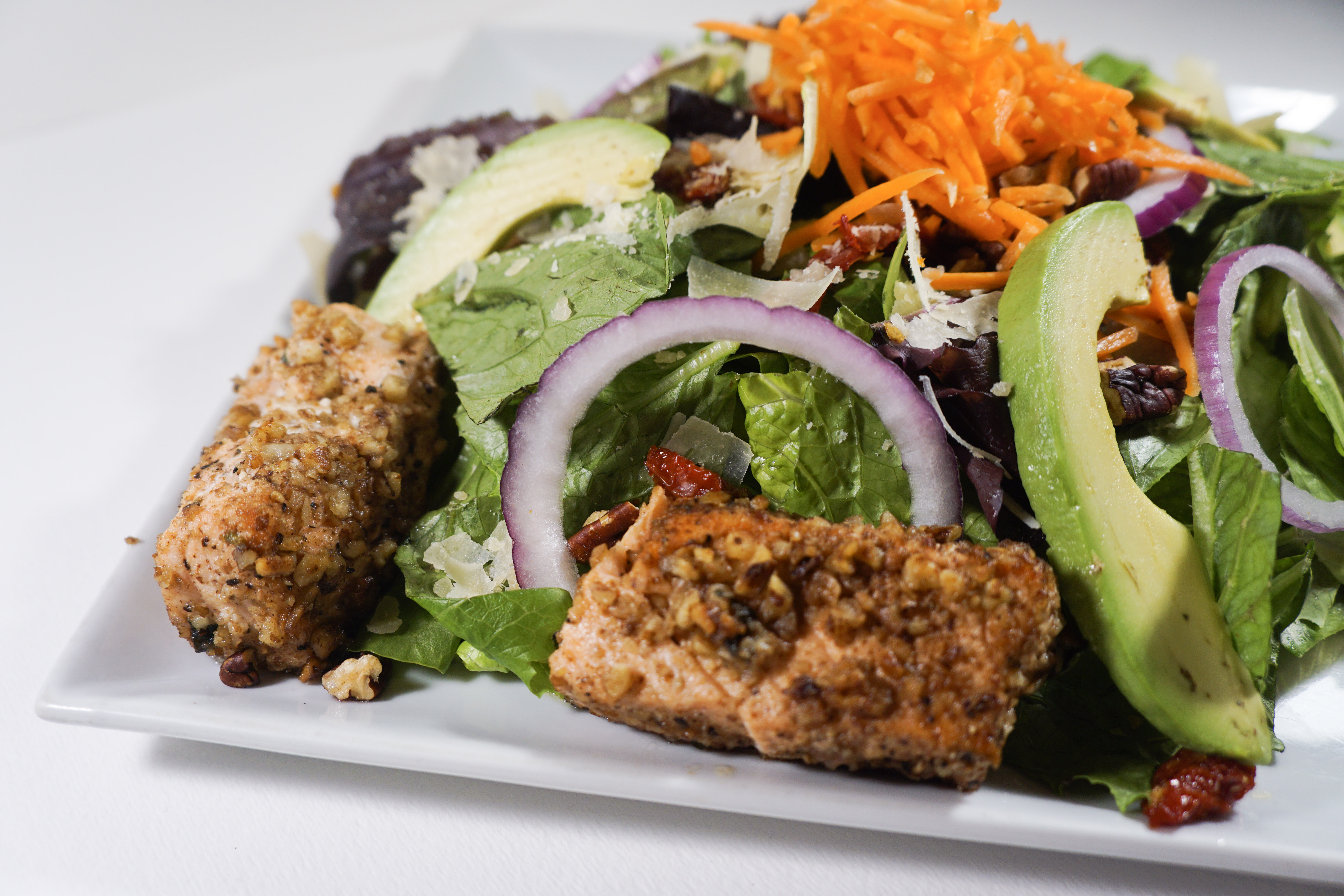 Order Pecan Crusted Salmon Salad food online from Mezza Grille store, Houston on bringmethat.com