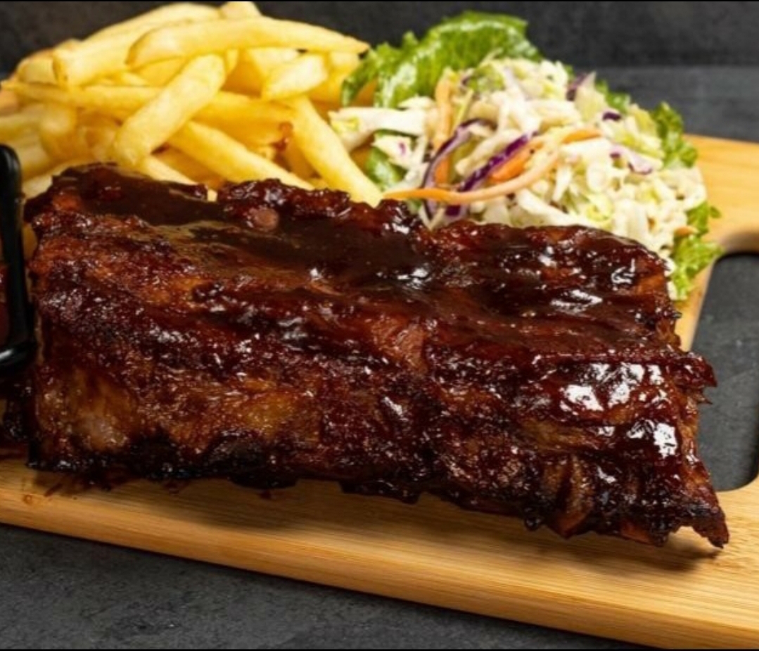 Order 1/2 Rack Baby Back Ribs food online from Wing Legends store, Compton on bringmethat.com