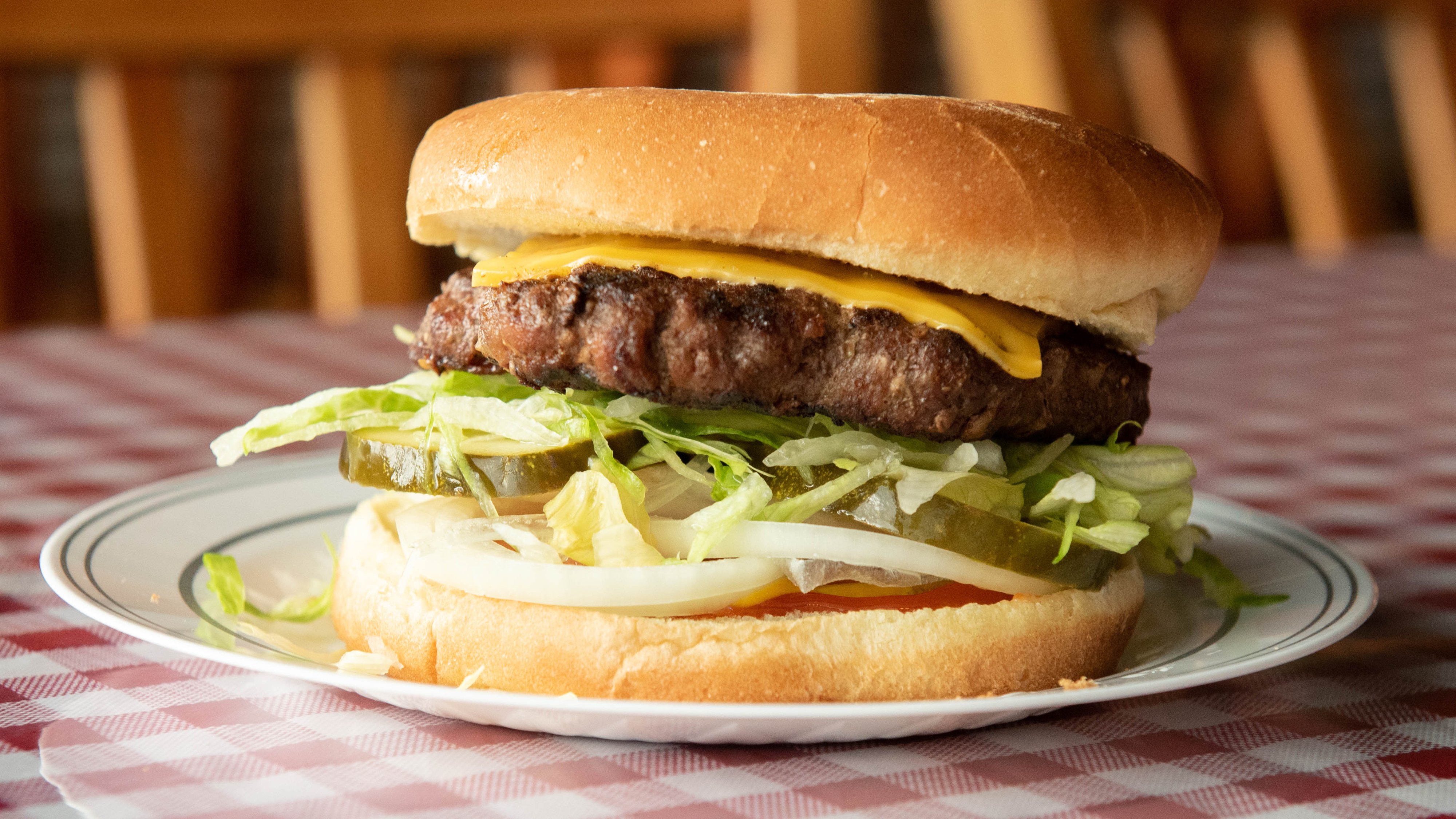 Order Cheeseburger food online from Russell's Barbecue store, Elmwood Park on bringmethat.com