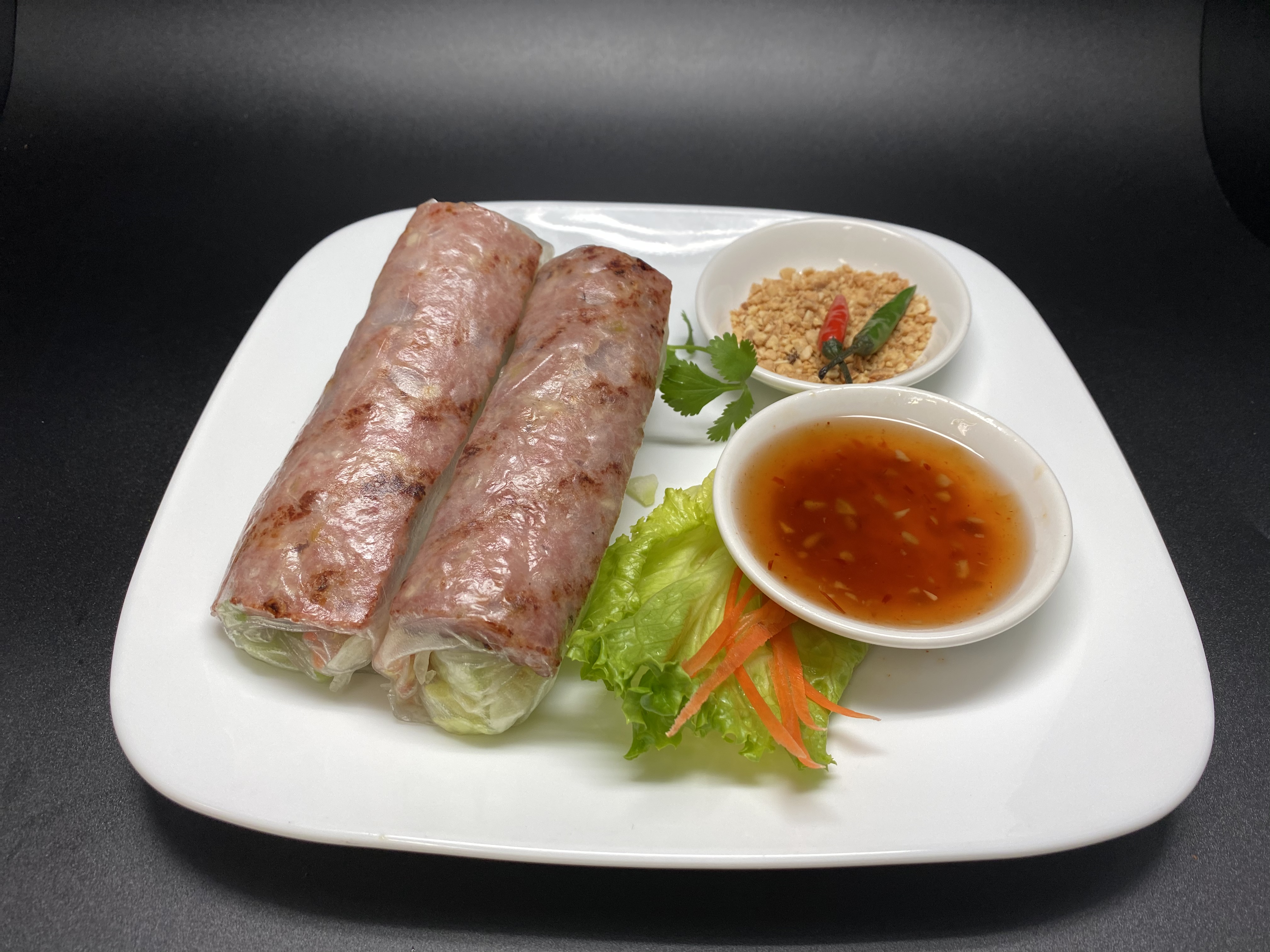 Order Asian Sausage Spring Rolls (NC) food online from Ha Long store, Irvine on bringmethat.com