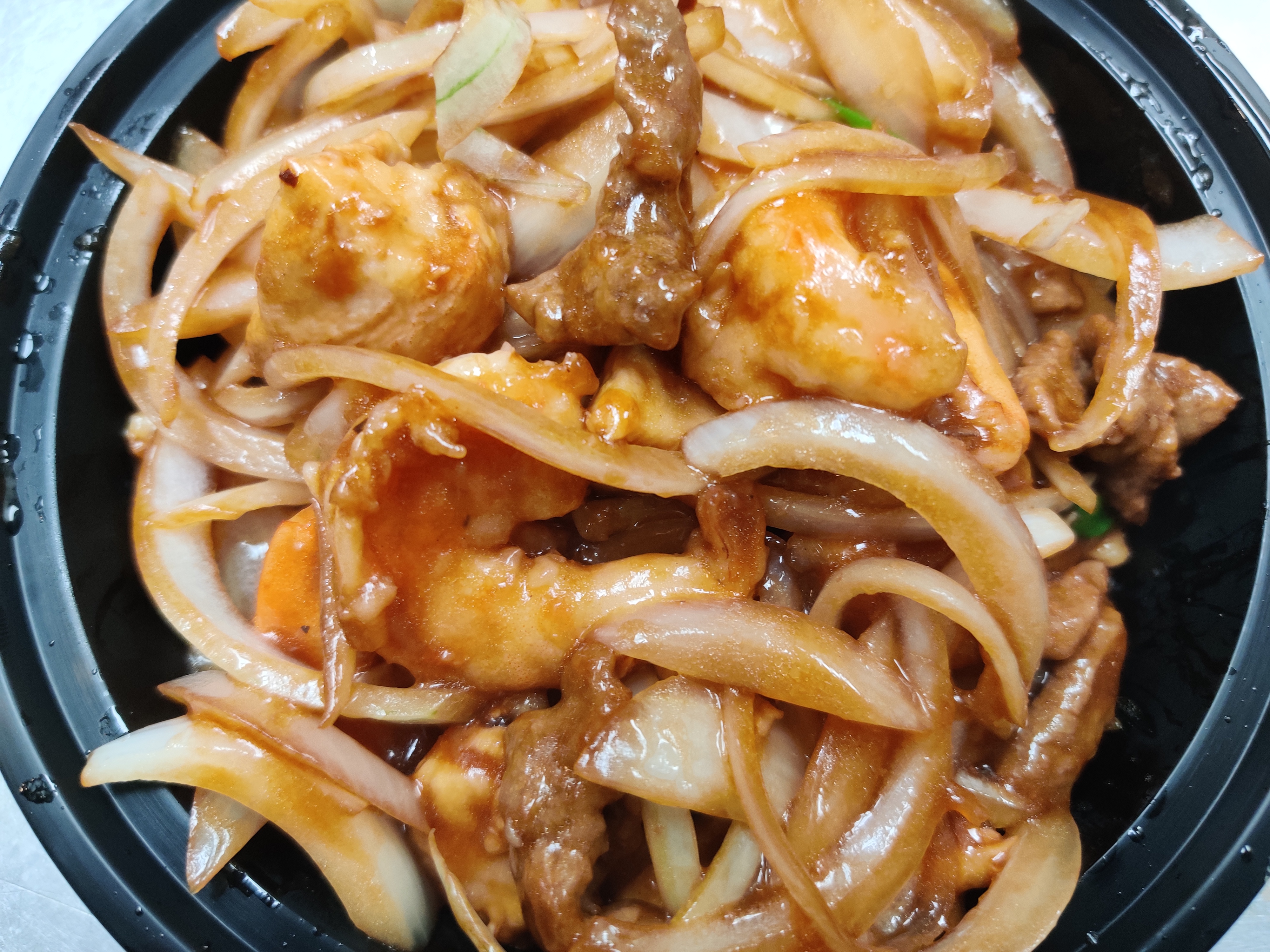 Order CS11. Sauteed Shrimp, Beef and Chicken in Mongolian style food online from Sam Cafe store, Houston on bringmethat.com