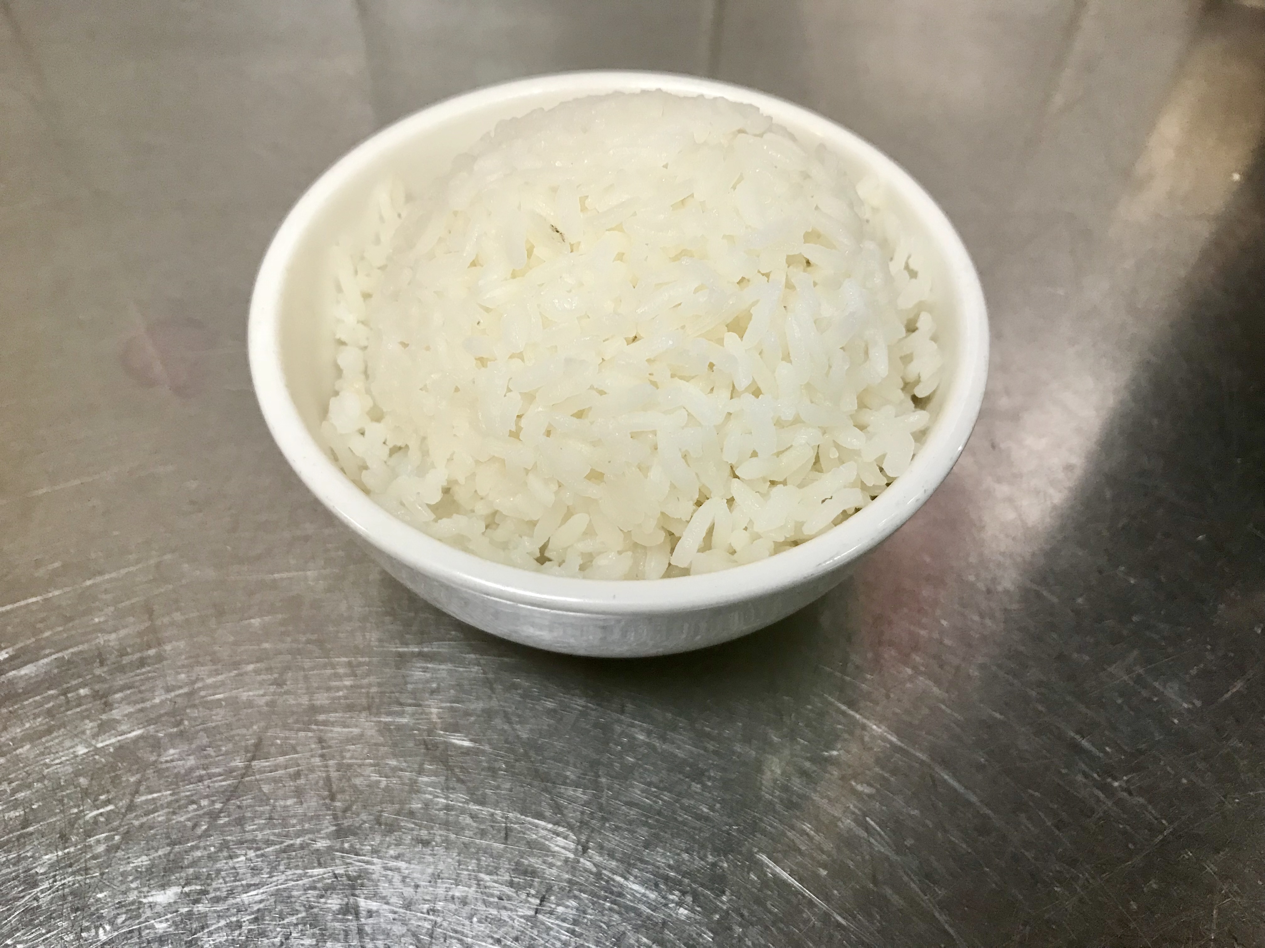 Order Side of White Rice food online from Ollie's To Go store, New York on bringmethat.com