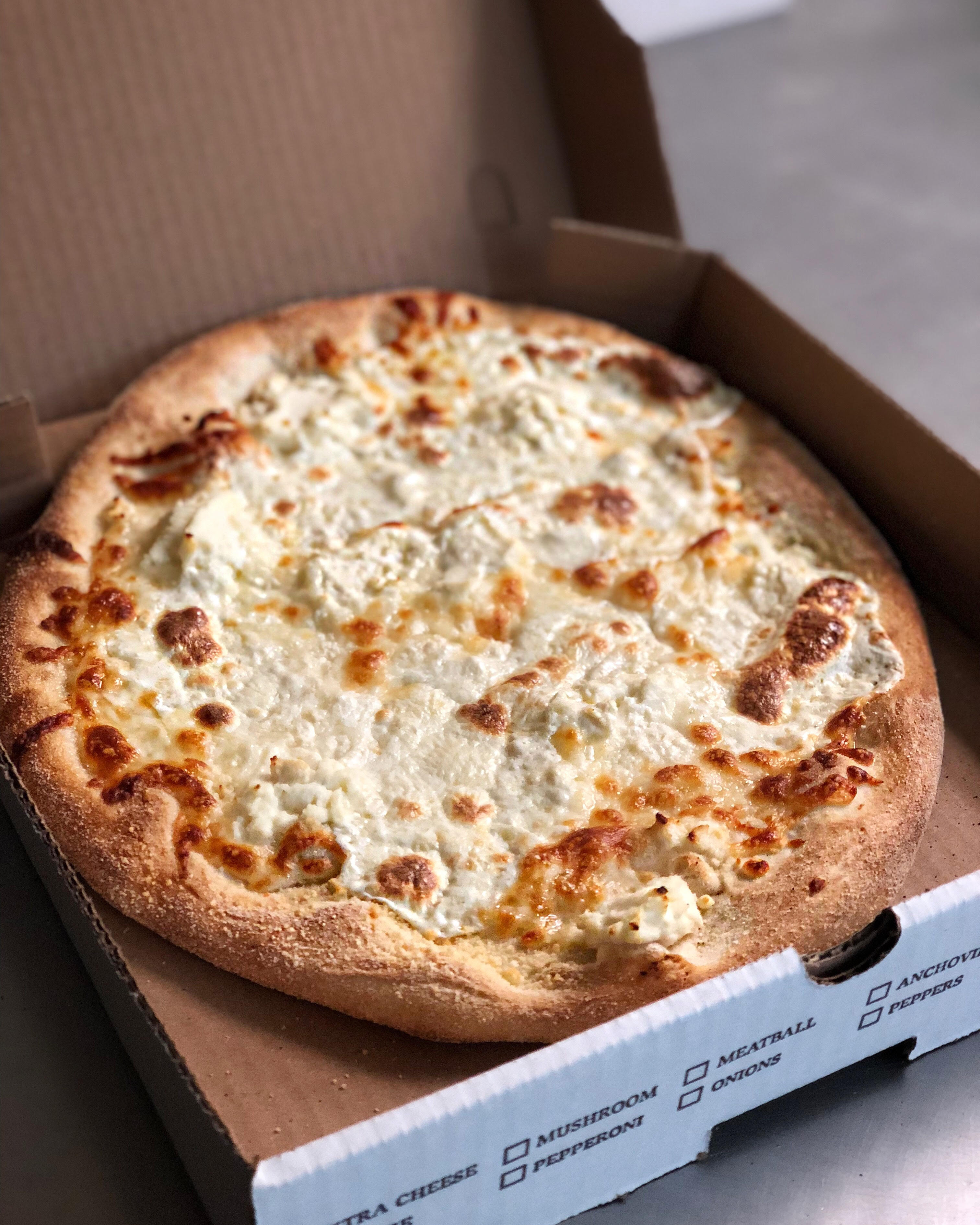 Order 4 Cheese White Pizza food online from Gaya Pizzeria store, Somerville on bringmethat.com