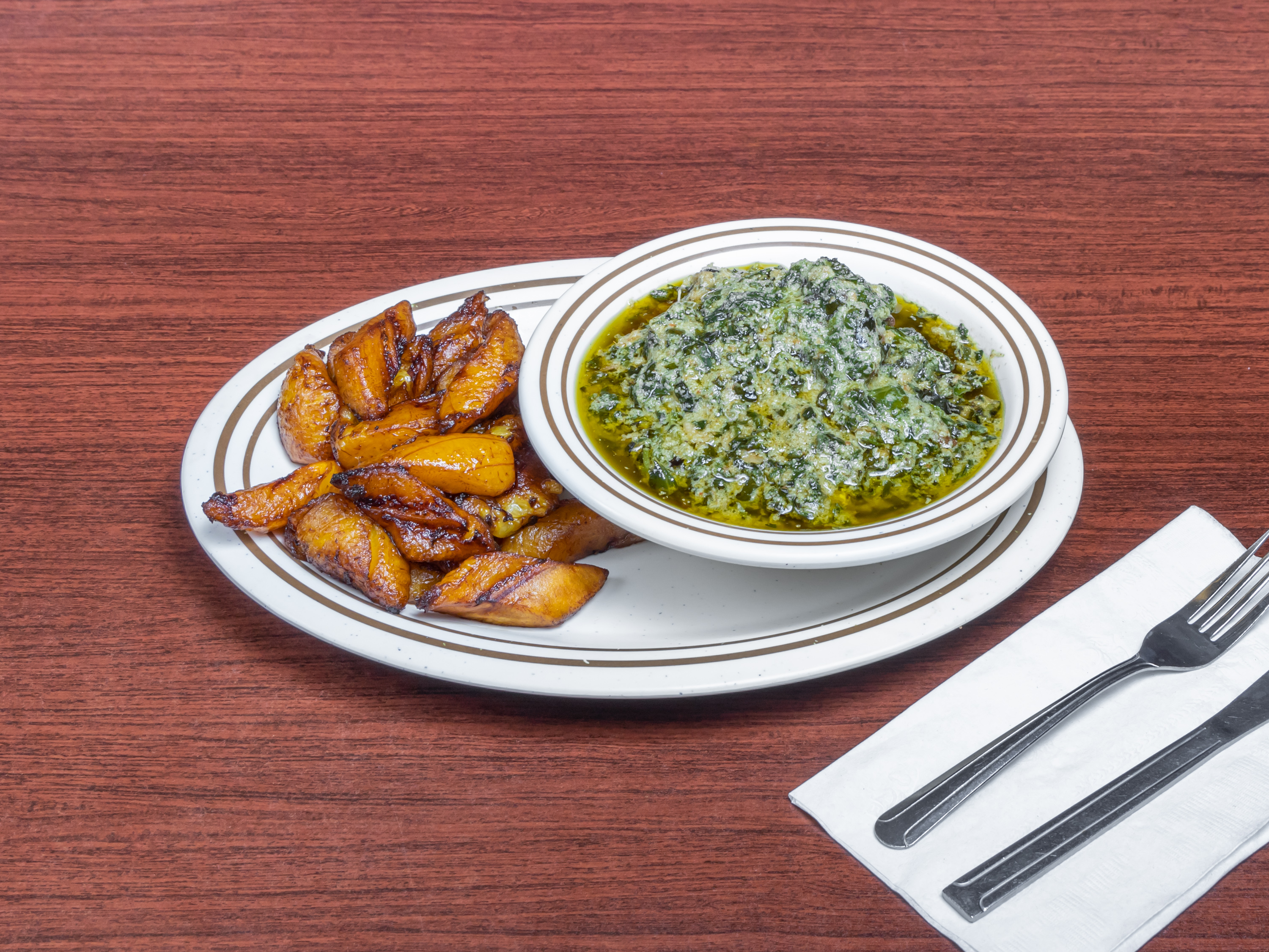 Order Ndole food online from Marie African Restaurant store, Houston on bringmethat.com