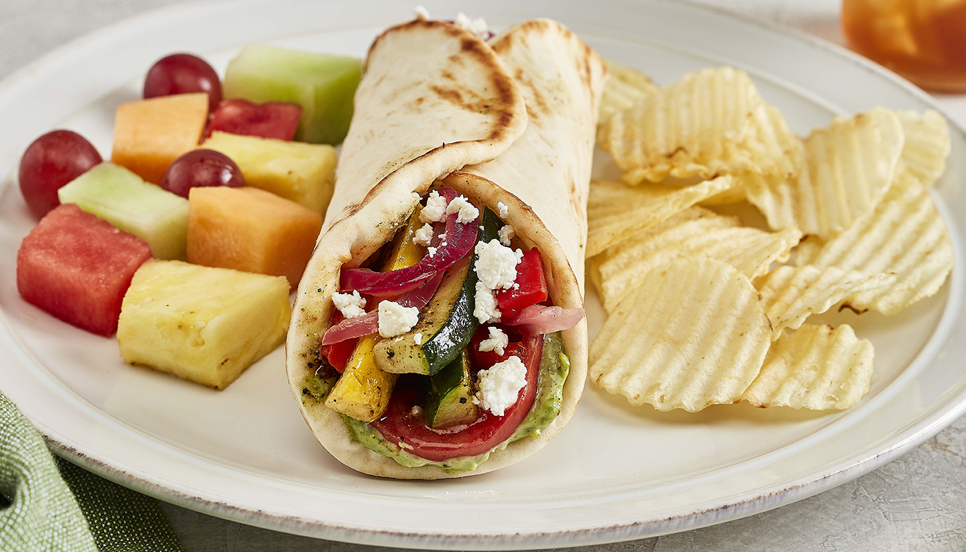 Order Grilled Veggie Gyro food online from Taziki Mediterranean Café store, Knoxville on bringmethat.com