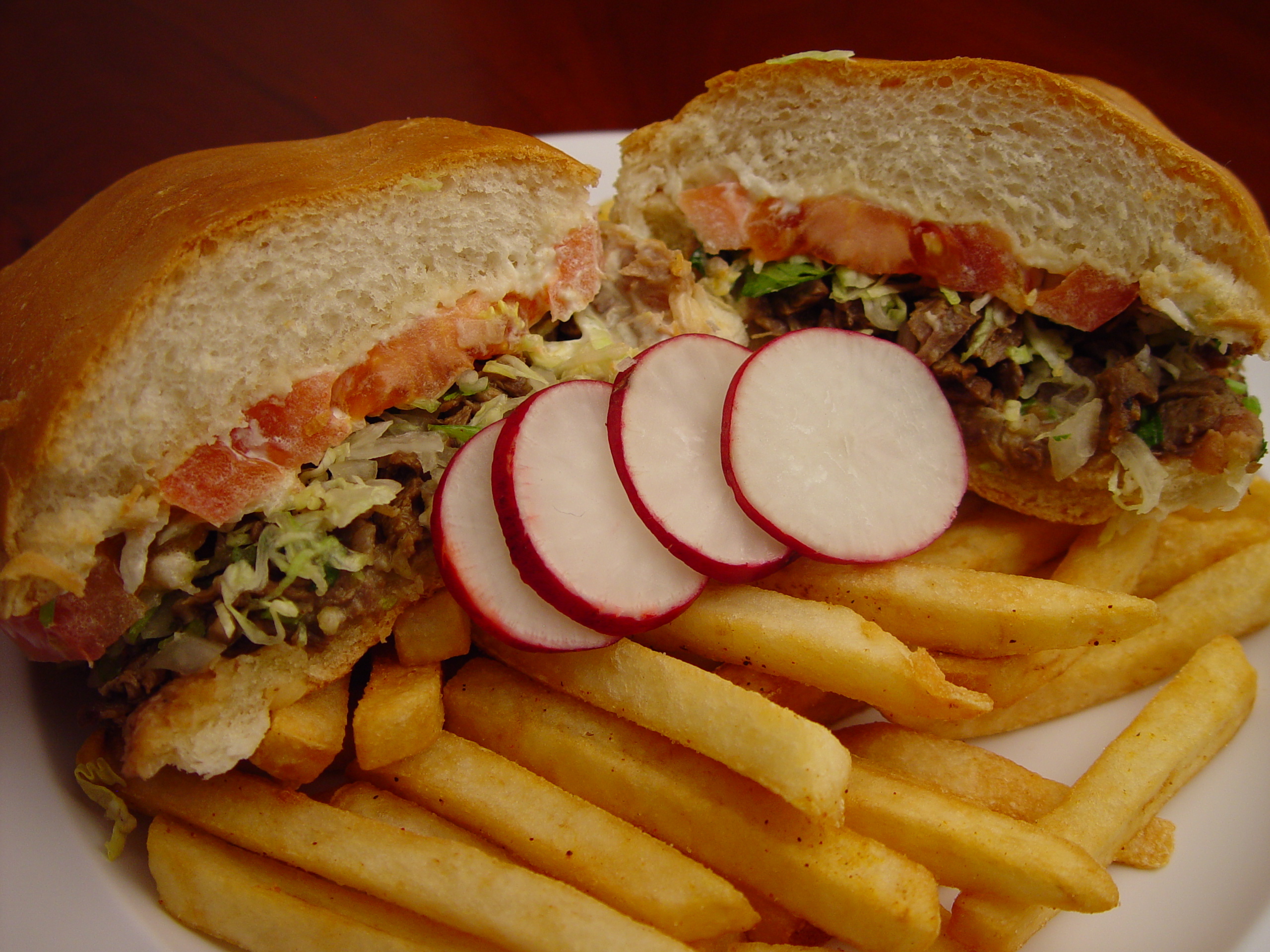 Order 24. Torta w/French Fries food online from Rodeo Mexican Grill store, Los Angeles on bringmethat.com