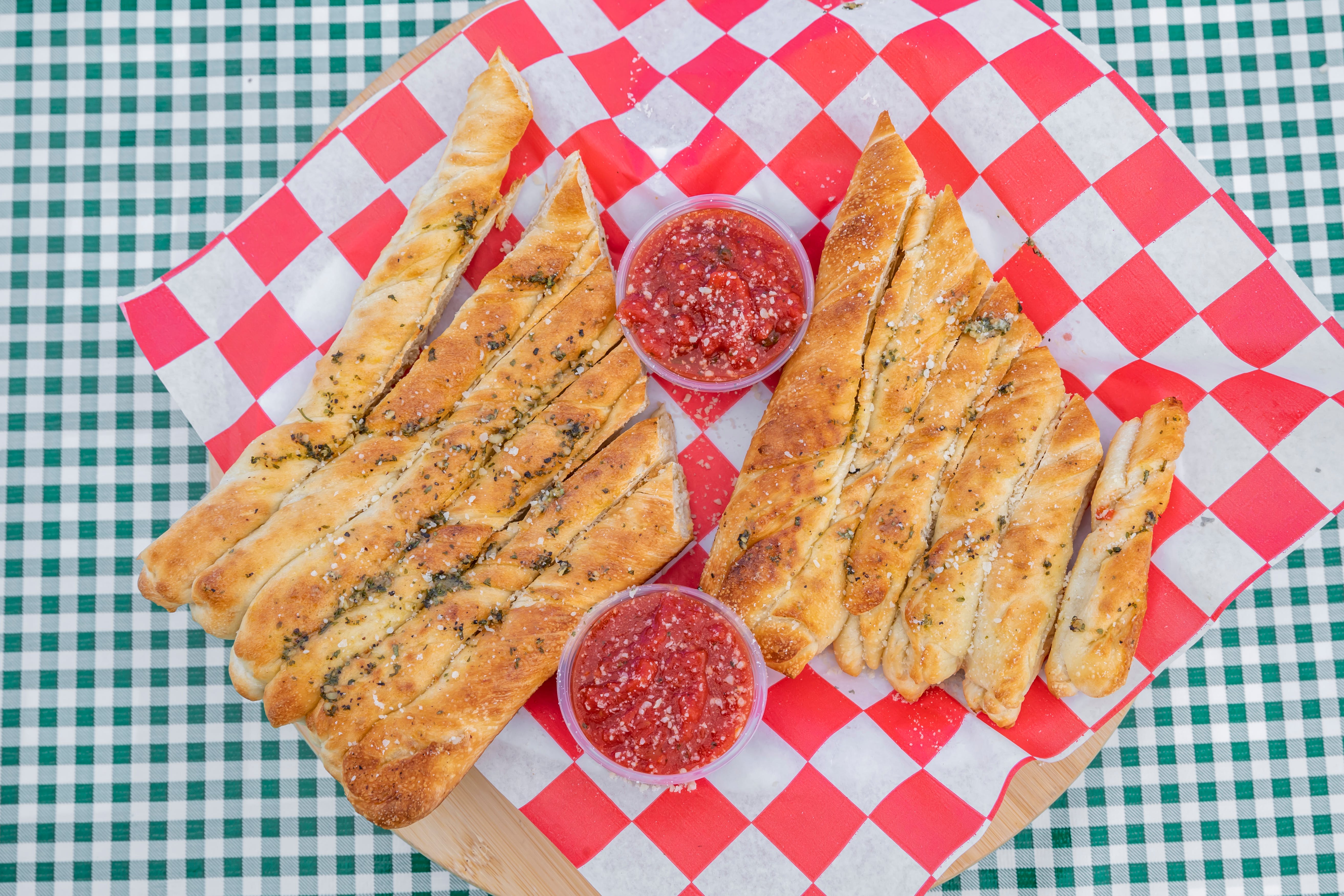 Order Breadsticks with Cheese - Appetizer food online from The Pizza Store store, Laguna Hills on bringmethat.com