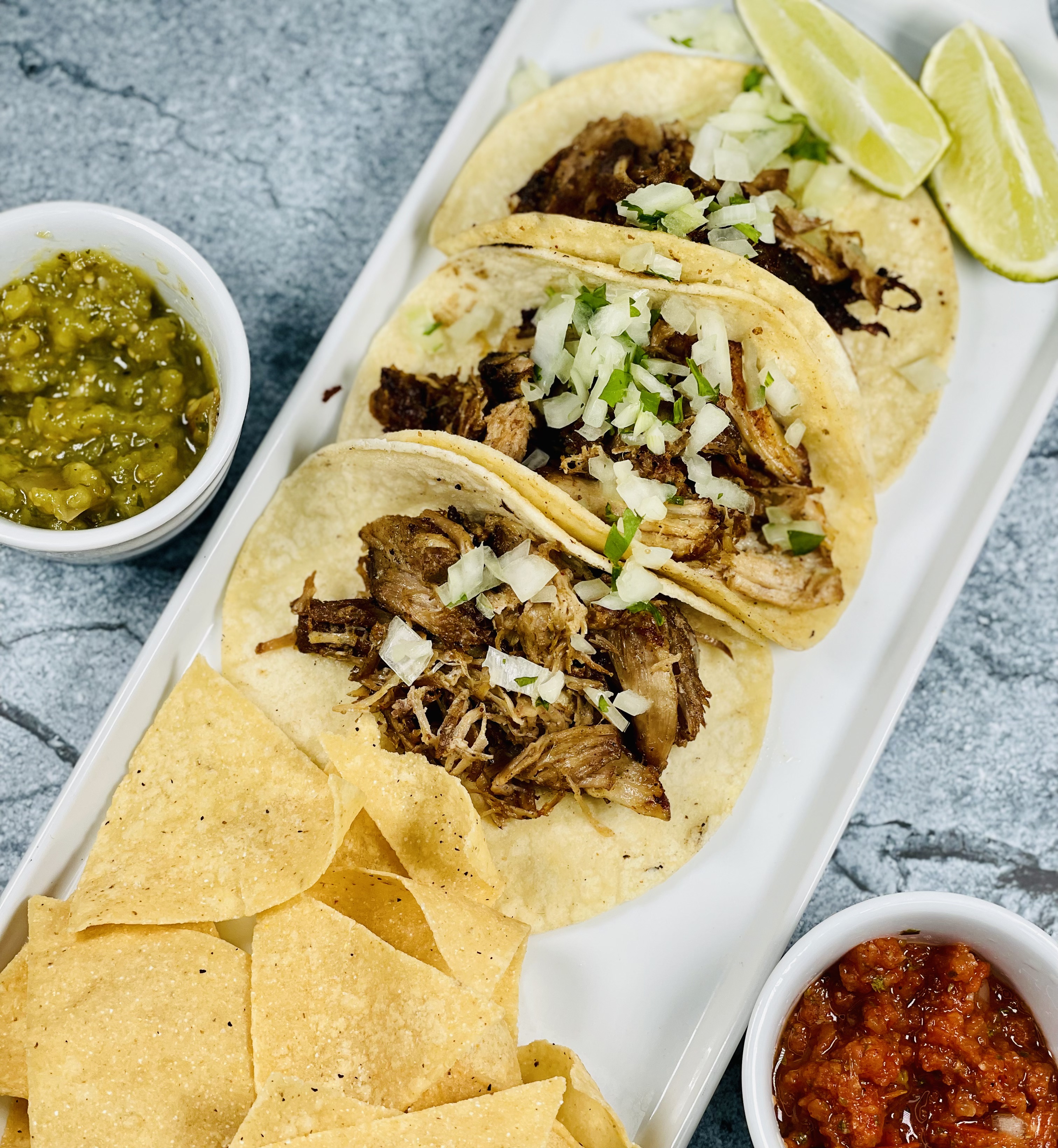 Order Carnitas Tacos - D food online from The Counter At Old Ballard Catering Co. store, Seattle on bringmethat.com