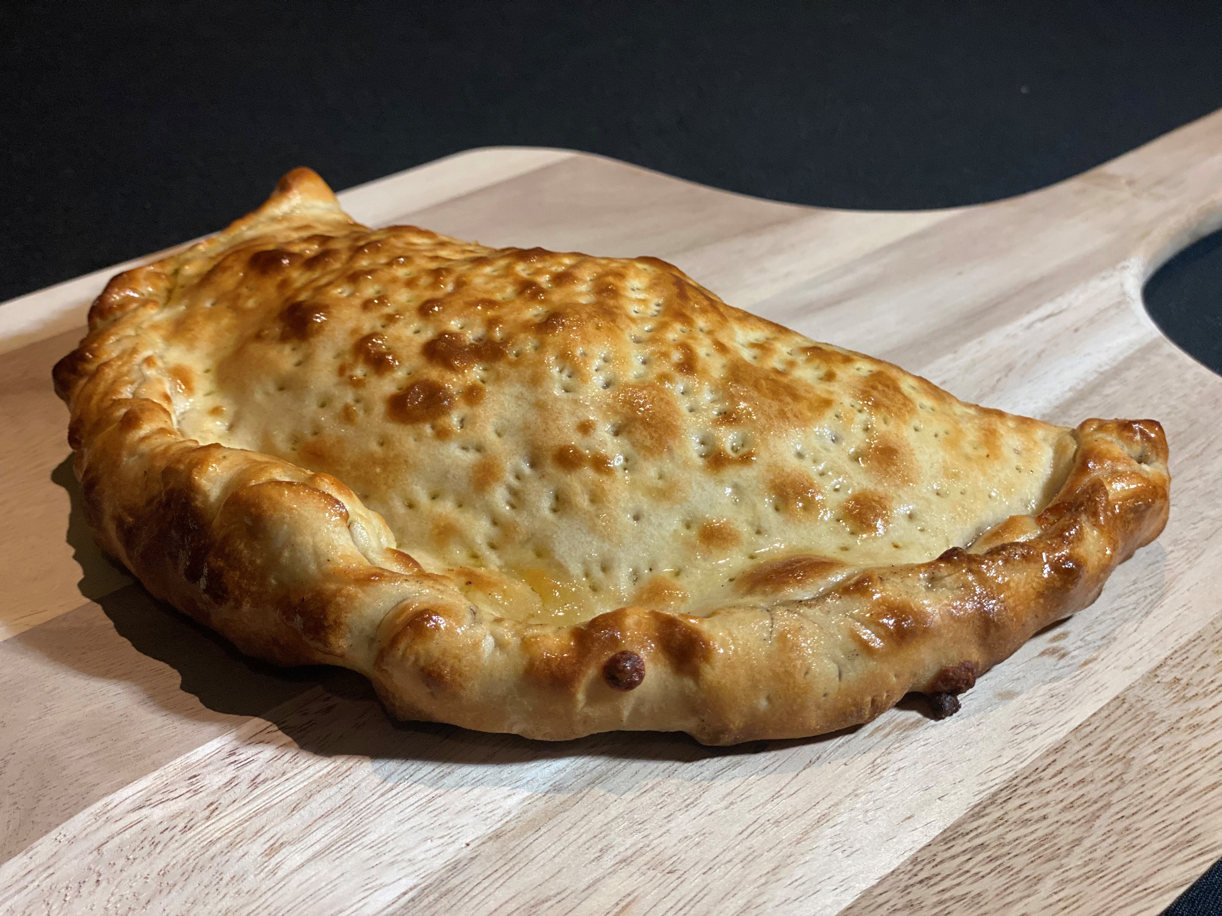 Order Traditional Calzone food online from 540 Pizzas & Calzones store, Dallas on bringmethat.com