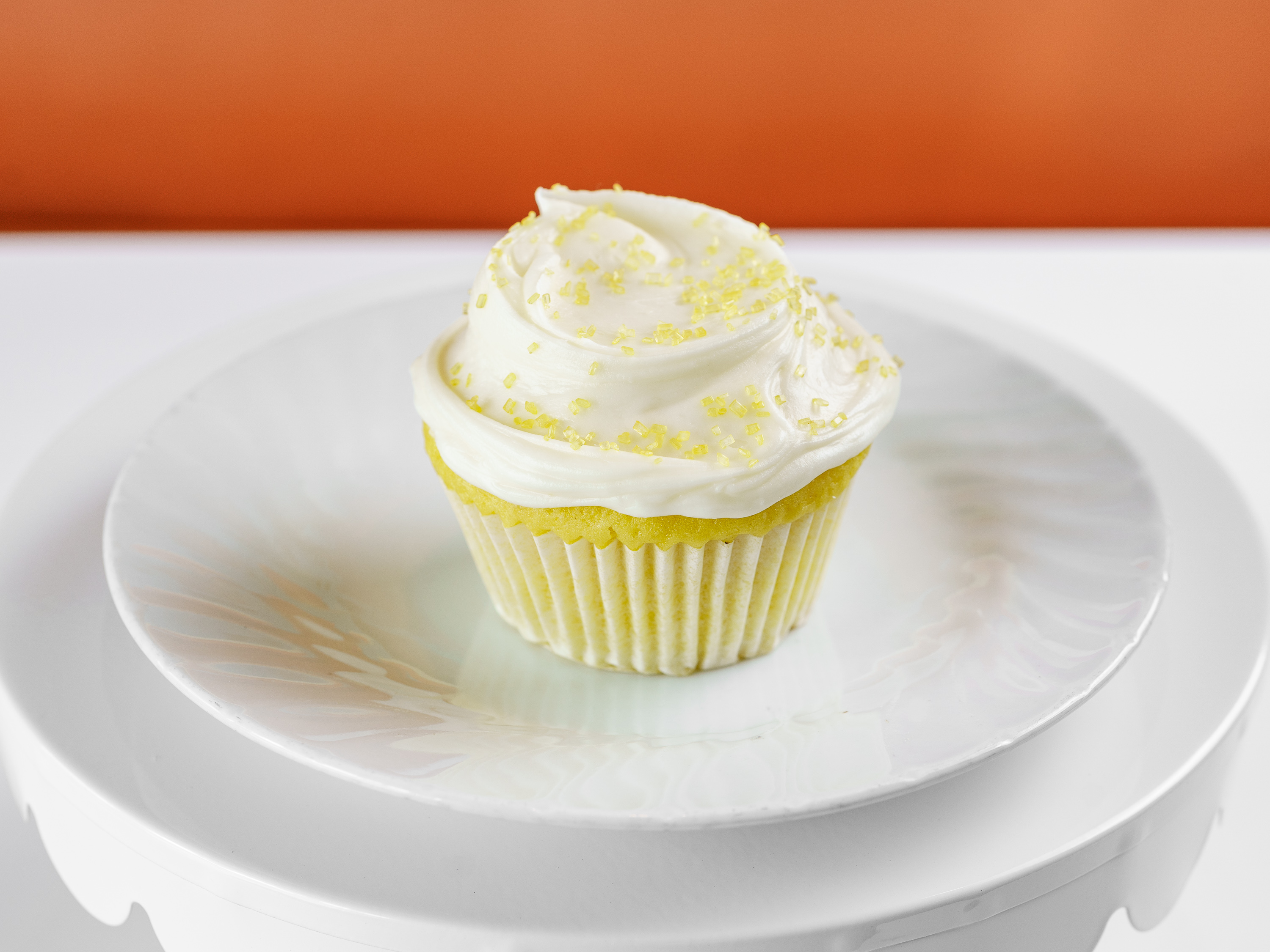 Order Lemon / Cream Cheese Cupcake food online from Frosted Cupcakery store, Long Beach on bringmethat.com