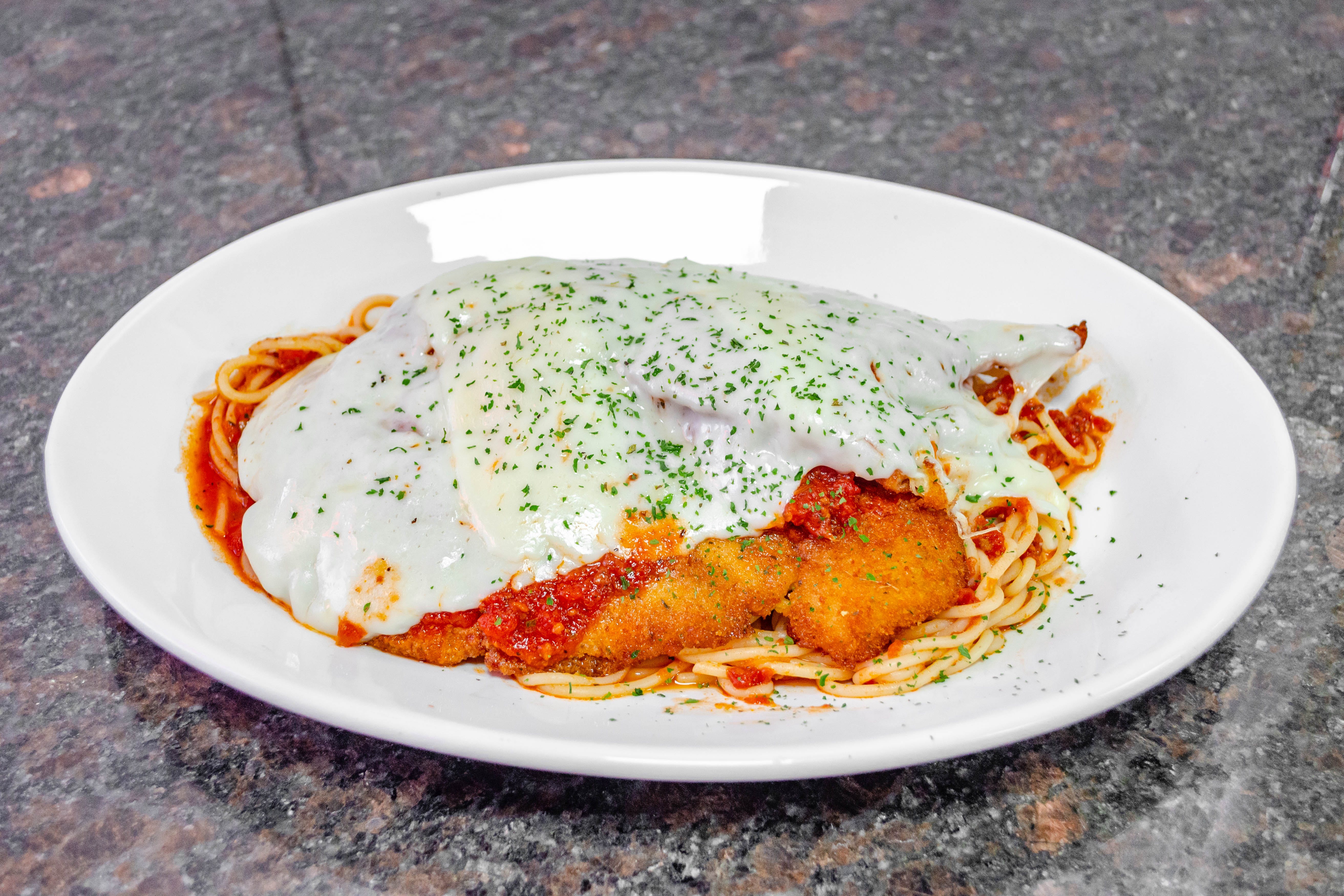Order Chicken Parmigiana Entree - Entree food online from Justino's Pizza store, New York on bringmethat.com