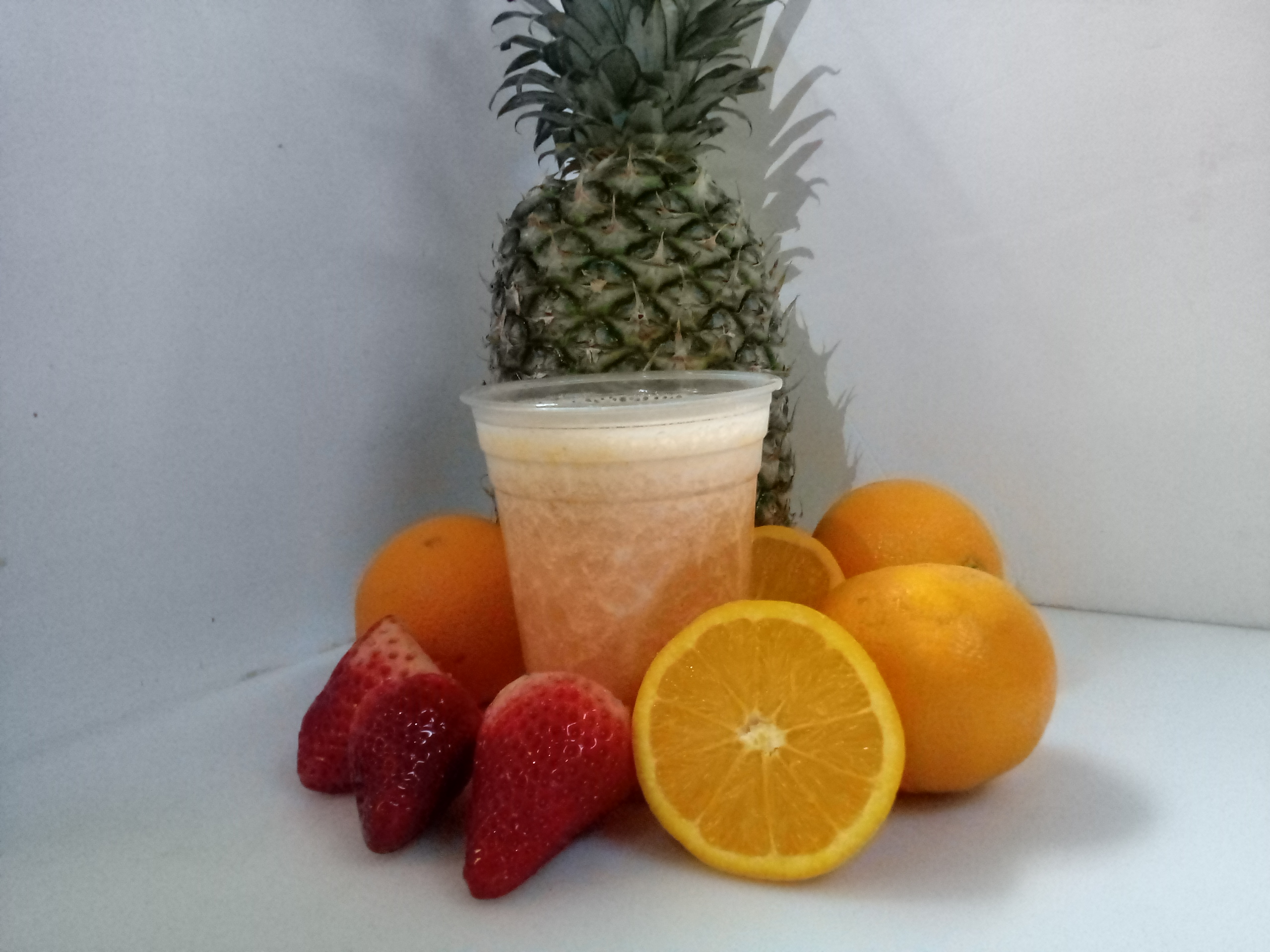 Order 4# Orange, Pineapple, Strawberry food online from El Papayon store, Ontario on bringmethat.com