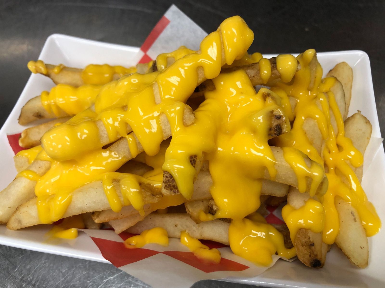 Order CHEESY FRIES food online from Super Crab Juicy Seafood store, Rochester on bringmethat.com