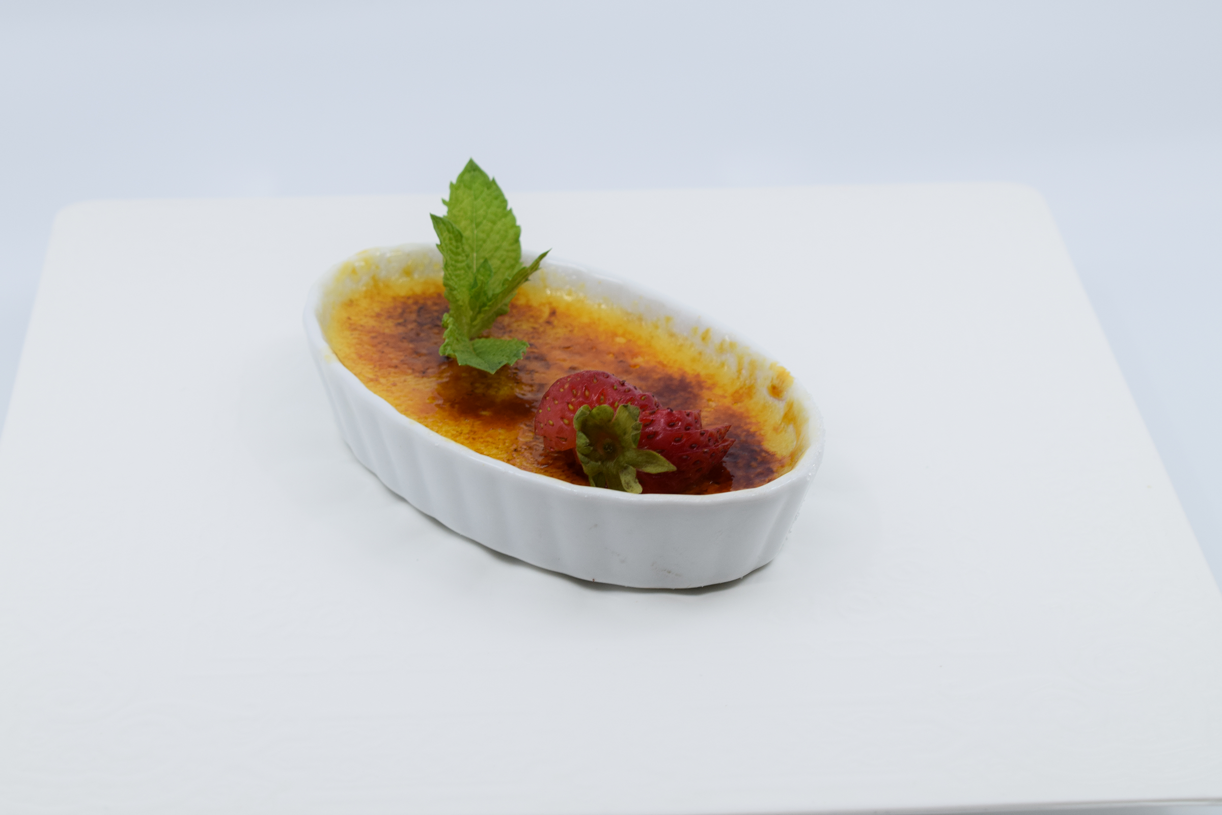 Order Creme Brûlée food online from Mad House Comedy Club store, San Diego on bringmethat.com