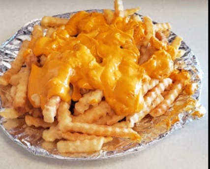 Order Cheese Fries - Appetizer food online from Johnny Pizza store, Prospect Park on bringmethat.com