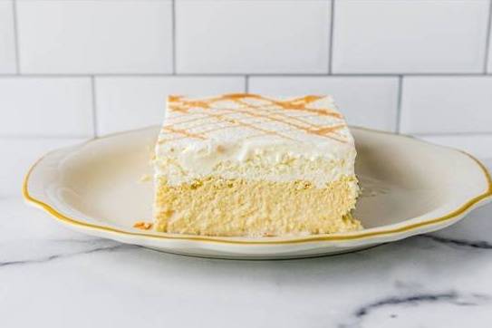 Order Vanilla Tres Leches Cake food online from The Chocolate Bar store, Houston on bringmethat.com