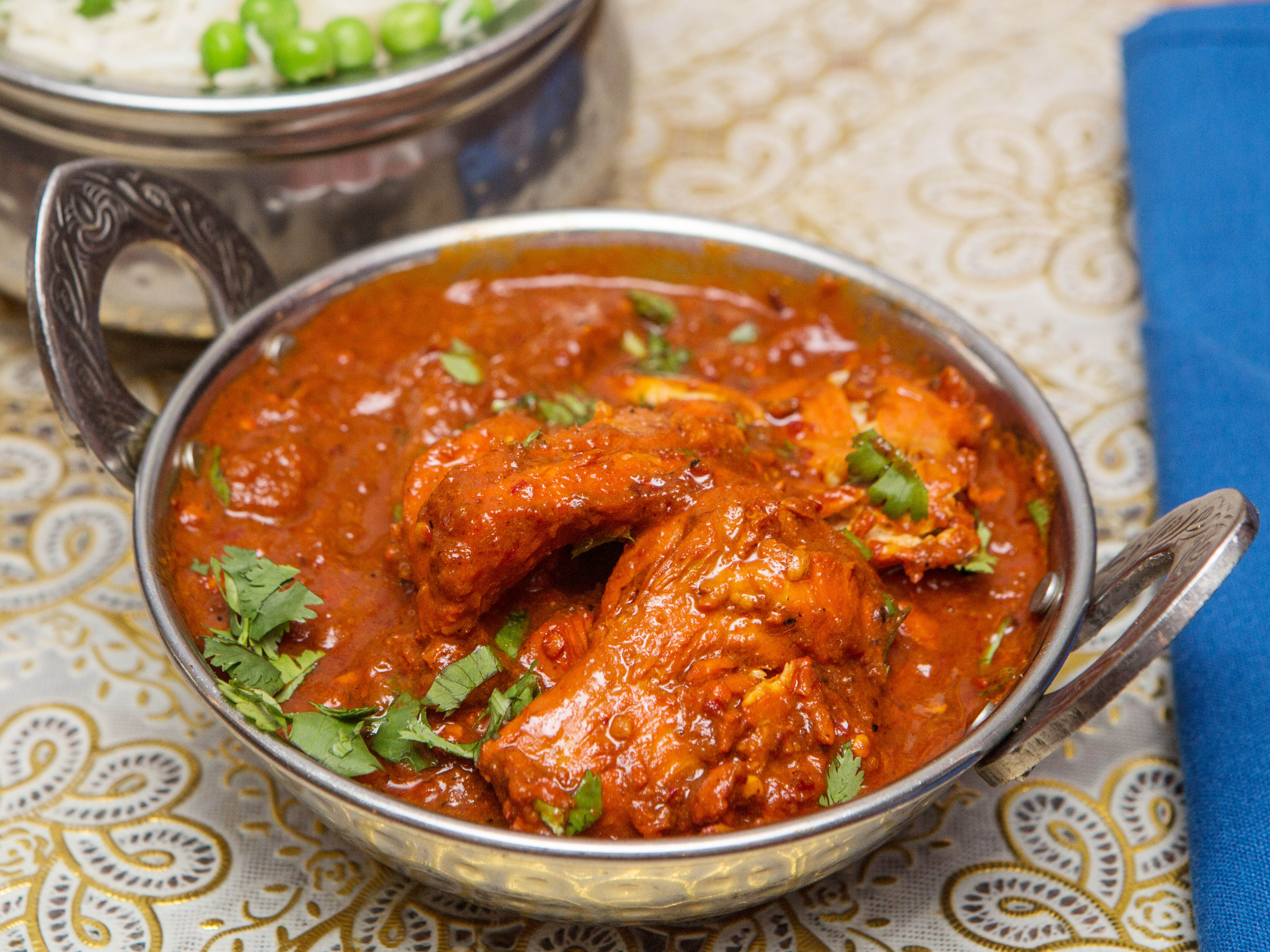 Order Chicken Vindaloo food online from Mughlai Indian Cuisine store, New York on bringmethat.com