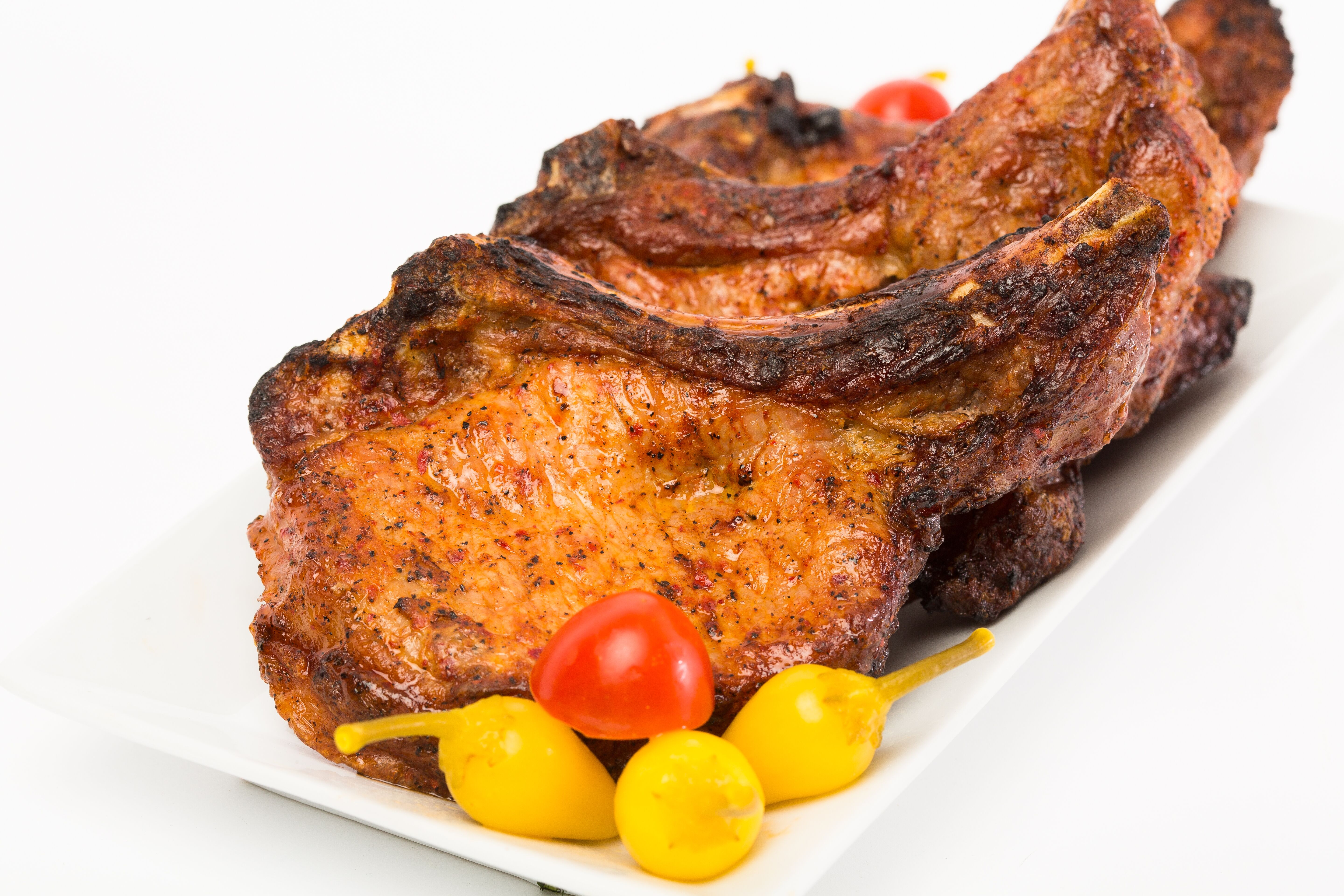Order Pork Chops food online from Paradise Pastry & Cafe store, Glendale on bringmethat.com