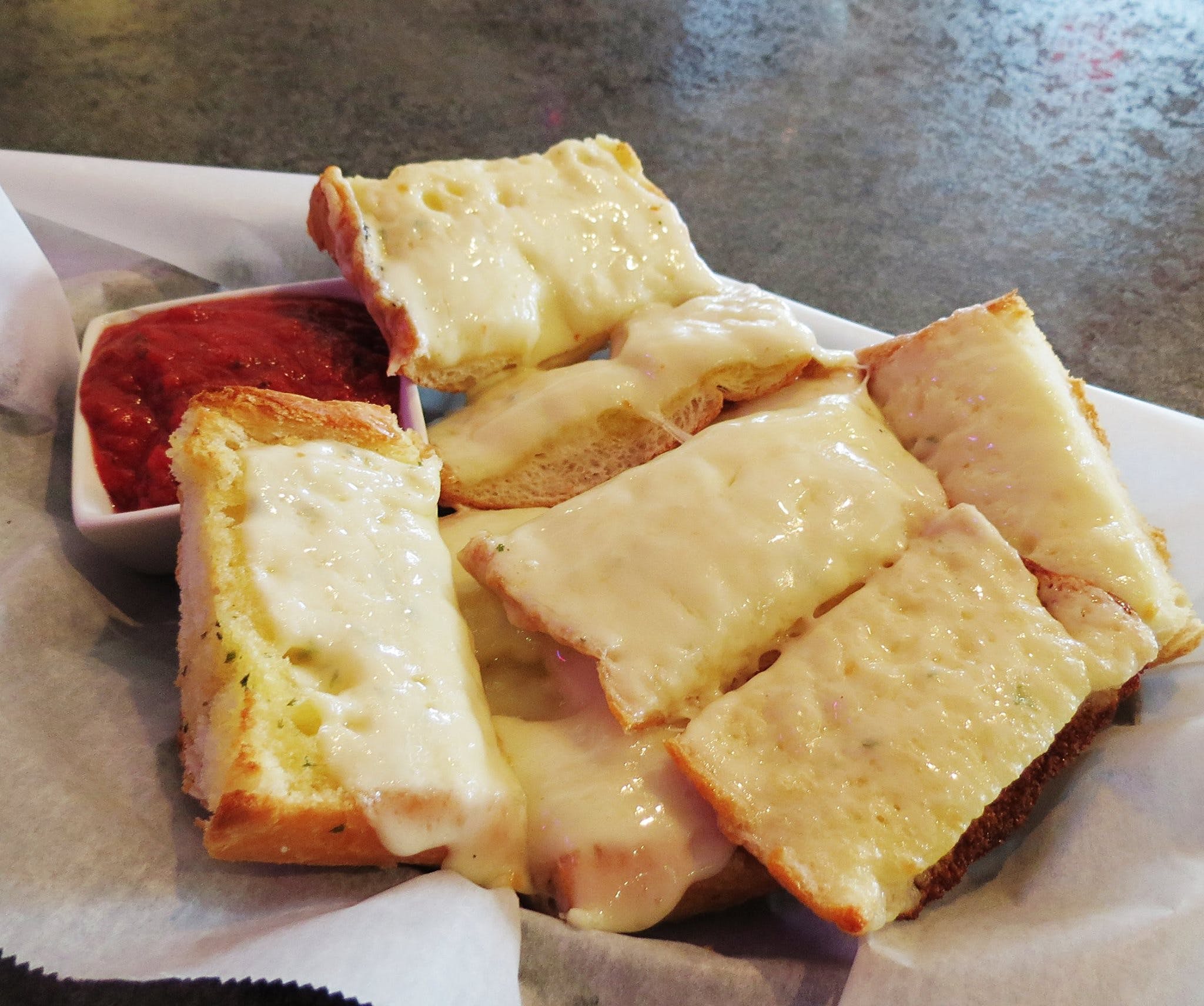 Order Garlic Cheese Bread - Appetizer food online from Nicky's Pizza store, Sheboygan on bringmethat.com
