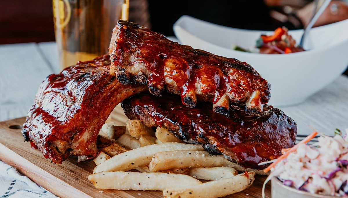Order BABY BACK STACKED RIBS food online from Gordon Biersch Brewery Restaurant store, Broomfield on bringmethat.com