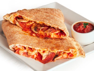Order Calzone - Calzone food online from Pizza Guys store, Chico on bringmethat.com