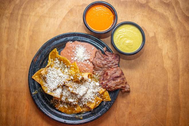 Order Chilaquiles food online from Adrians Tacos California store, Houston on bringmethat.com