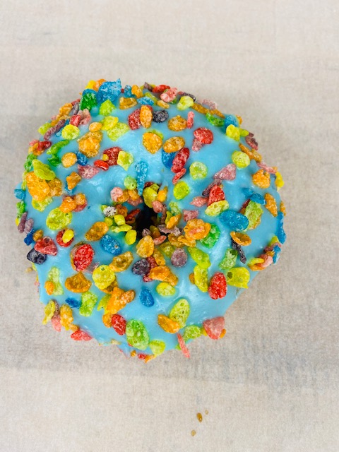 Order Fruity Pebble Donut food online from Highland Donuts store, Bakersfield on bringmethat.com