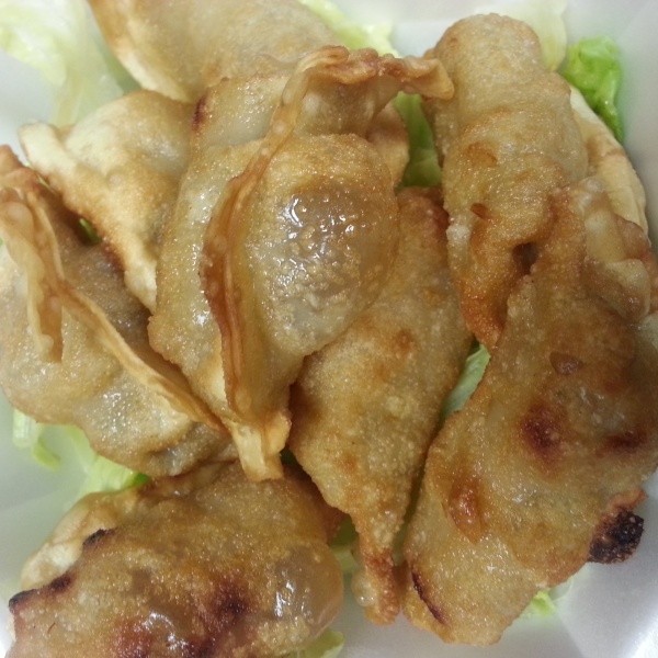 Order A12. Gyoza Dumplings food online from Jasmine Garden store, Falls Church on bringmethat.com