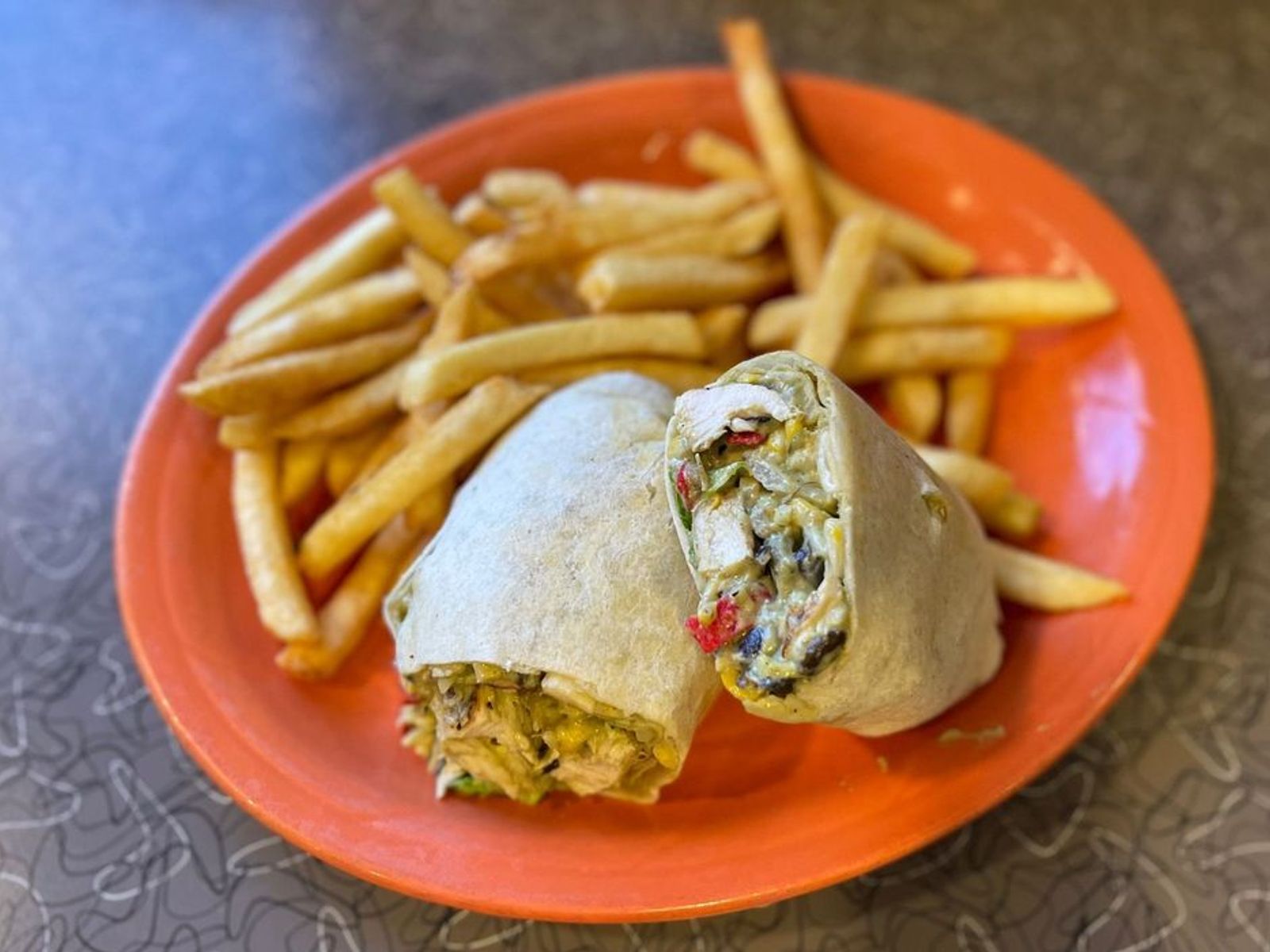 Order Fiesta Chicken Wrap- OO food online from Biscuits Cafe store, Chandler on bringmethat.com