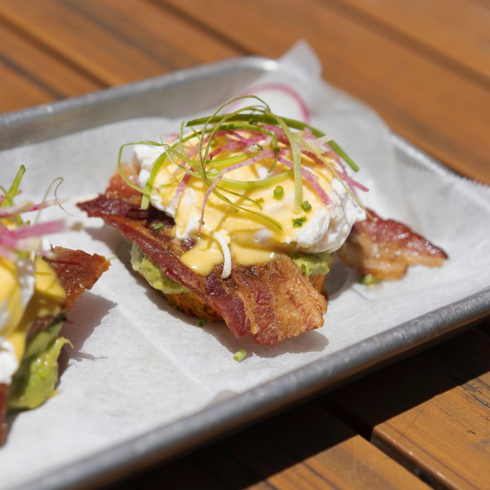 Order Eggs Benedict with Bacon food online from Bulletproof Cafe store, Santa Monica on bringmethat.com