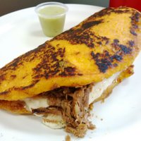 Order Queso de Mano o Guayanes con Carne Mechado Cachapa food online from Natarica Grill Restaurant store, Norcross on bringmethat.com