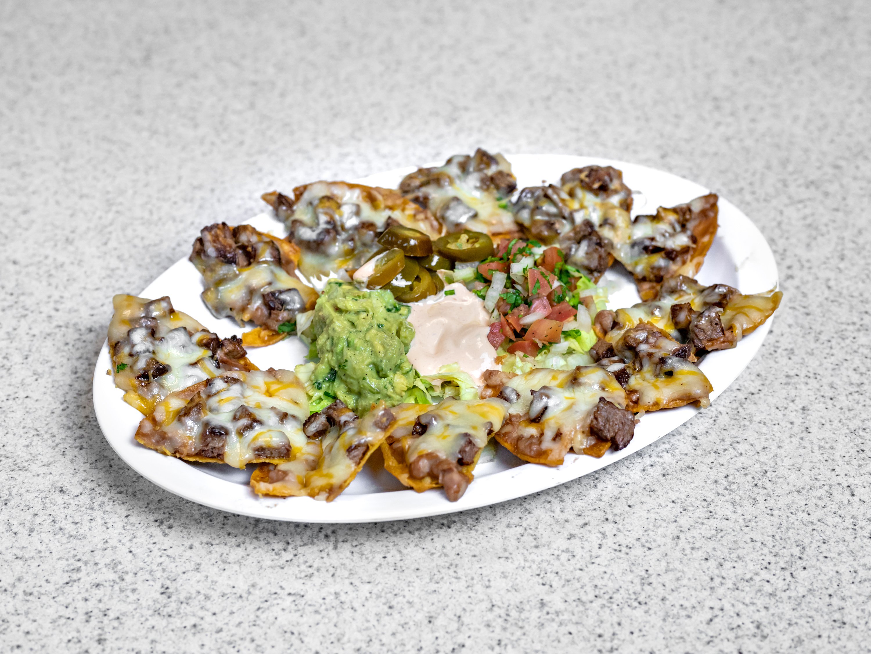 Order Nachos Combo food online from Tacos Don Chile store, Baton Rouge on bringmethat.com