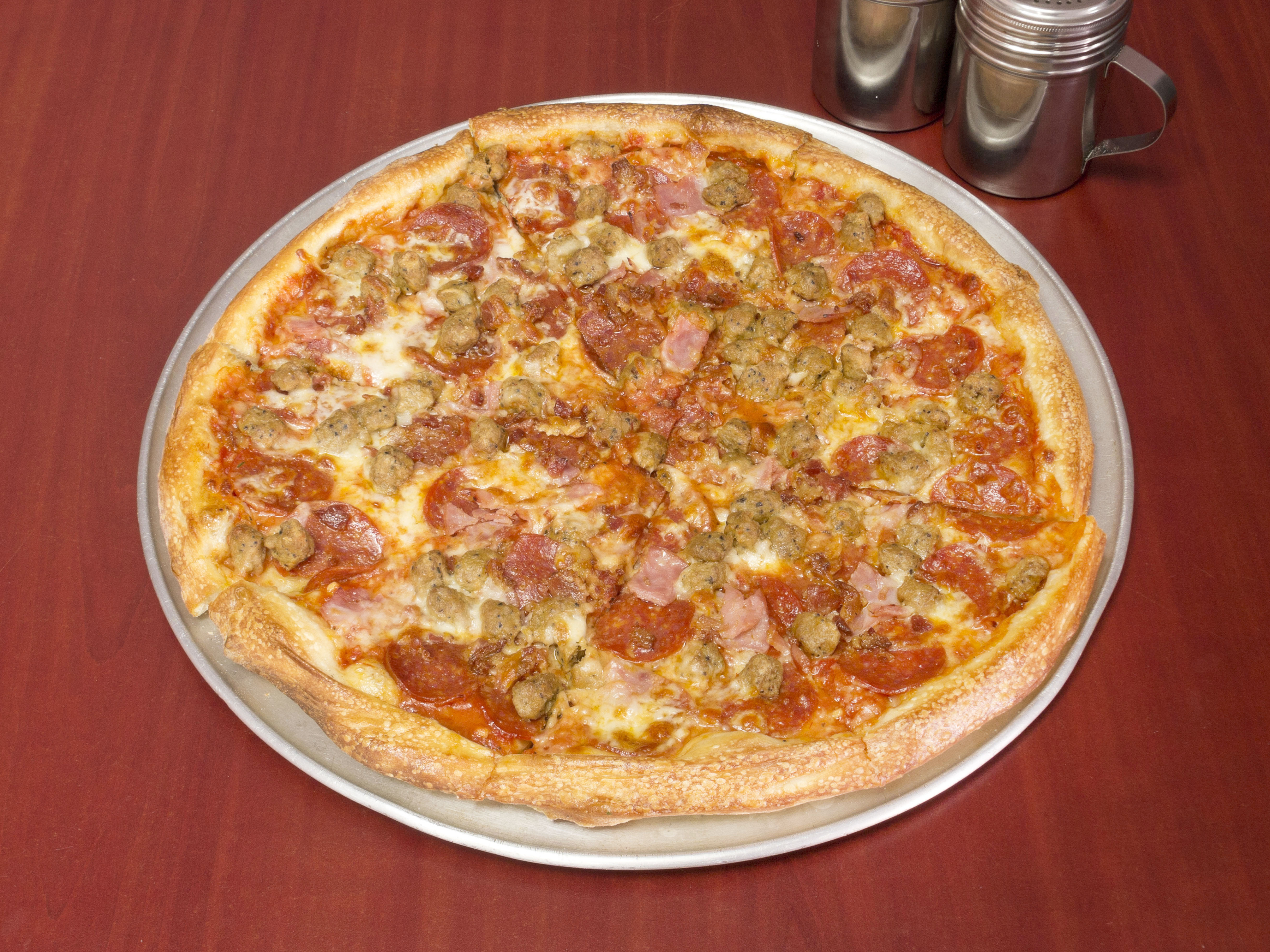 Order D. Mega Meat Lovers Pizza food online from Pepes Pizza store, North Richland Hills on bringmethat.com