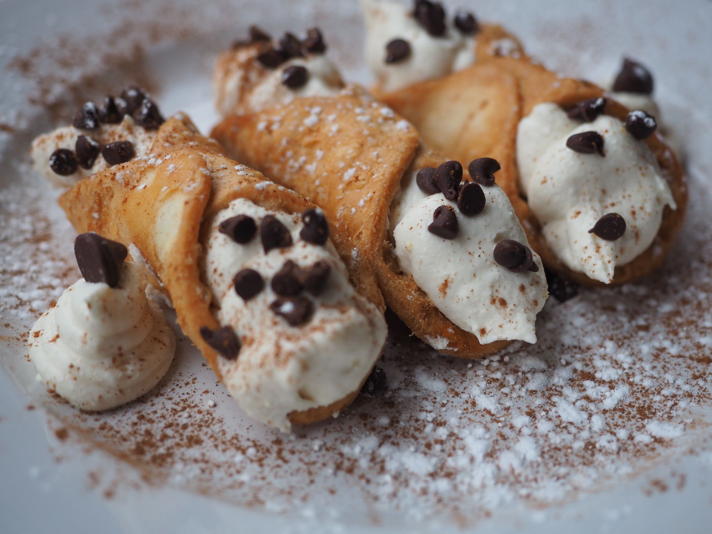 Order Homemade 3 Mini Cannoli food online from Don giovanni ristorante catering store, New York on bringmethat.com