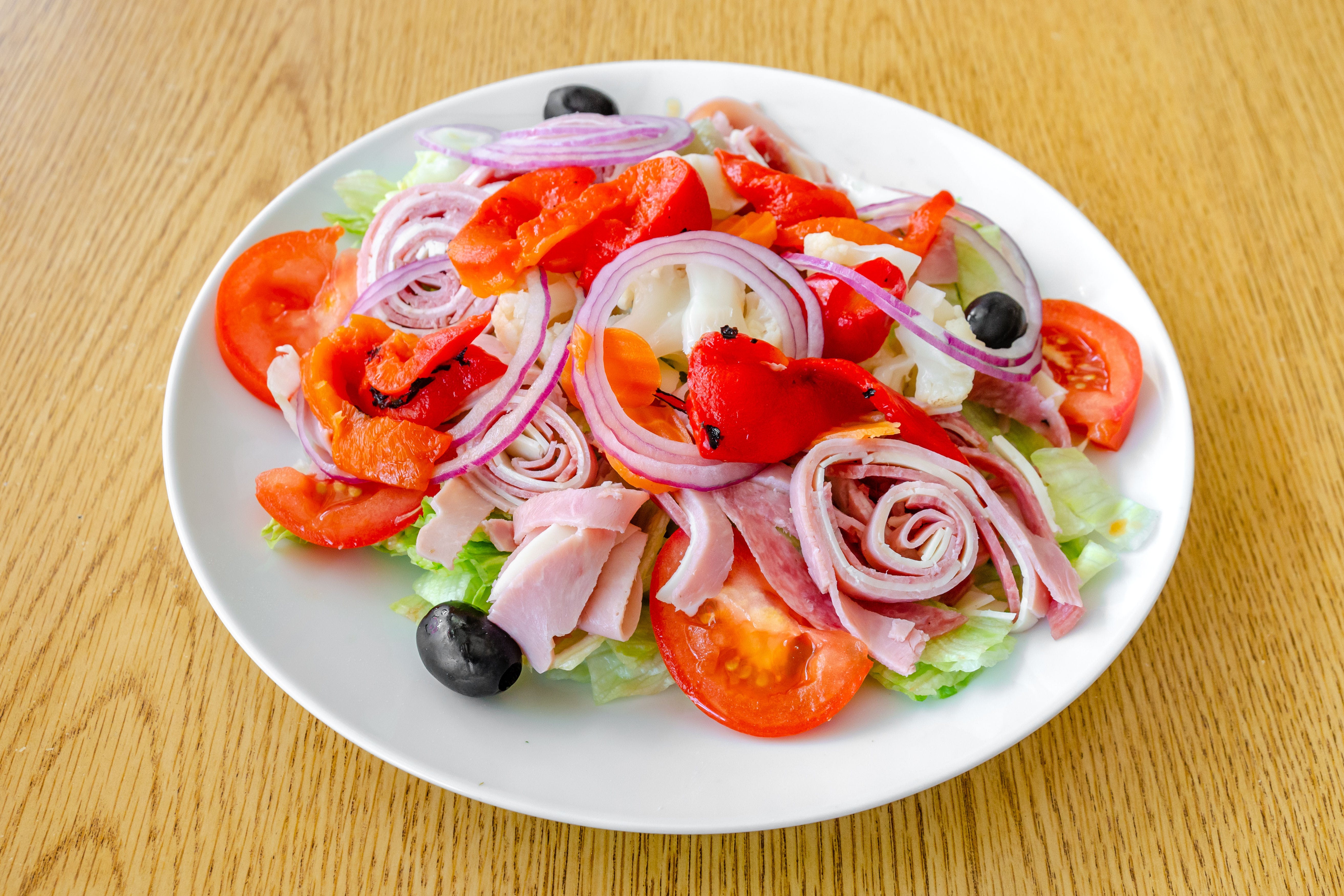 Order Antipasto Salad - Salad food online from New Pizza On The Block store, West New York on bringmethat.com