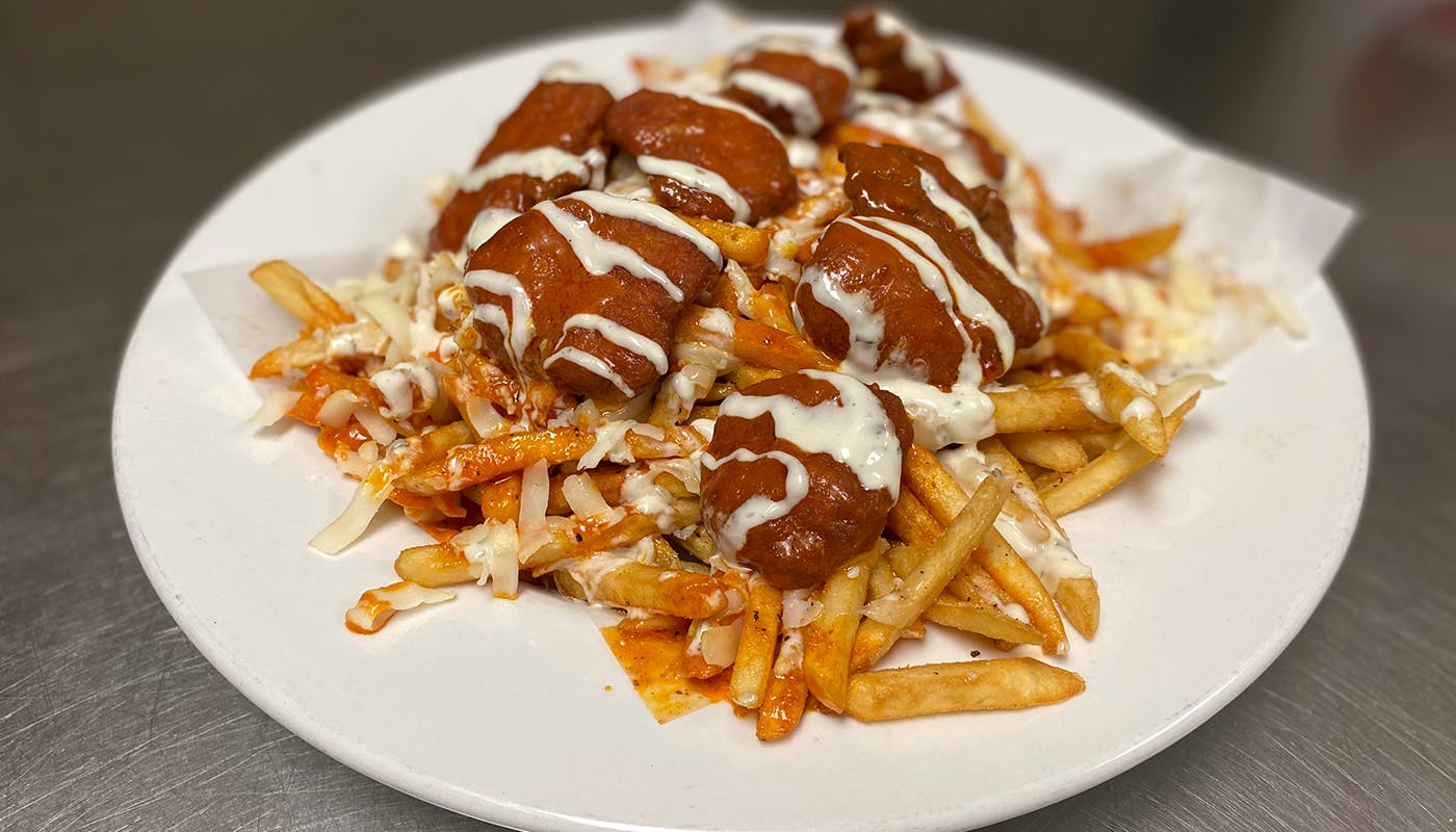 Order Buffalo Chicken French Fries - Fries food online from New York New York Pizza and Pasta store, La Mesa on bringmethat.com