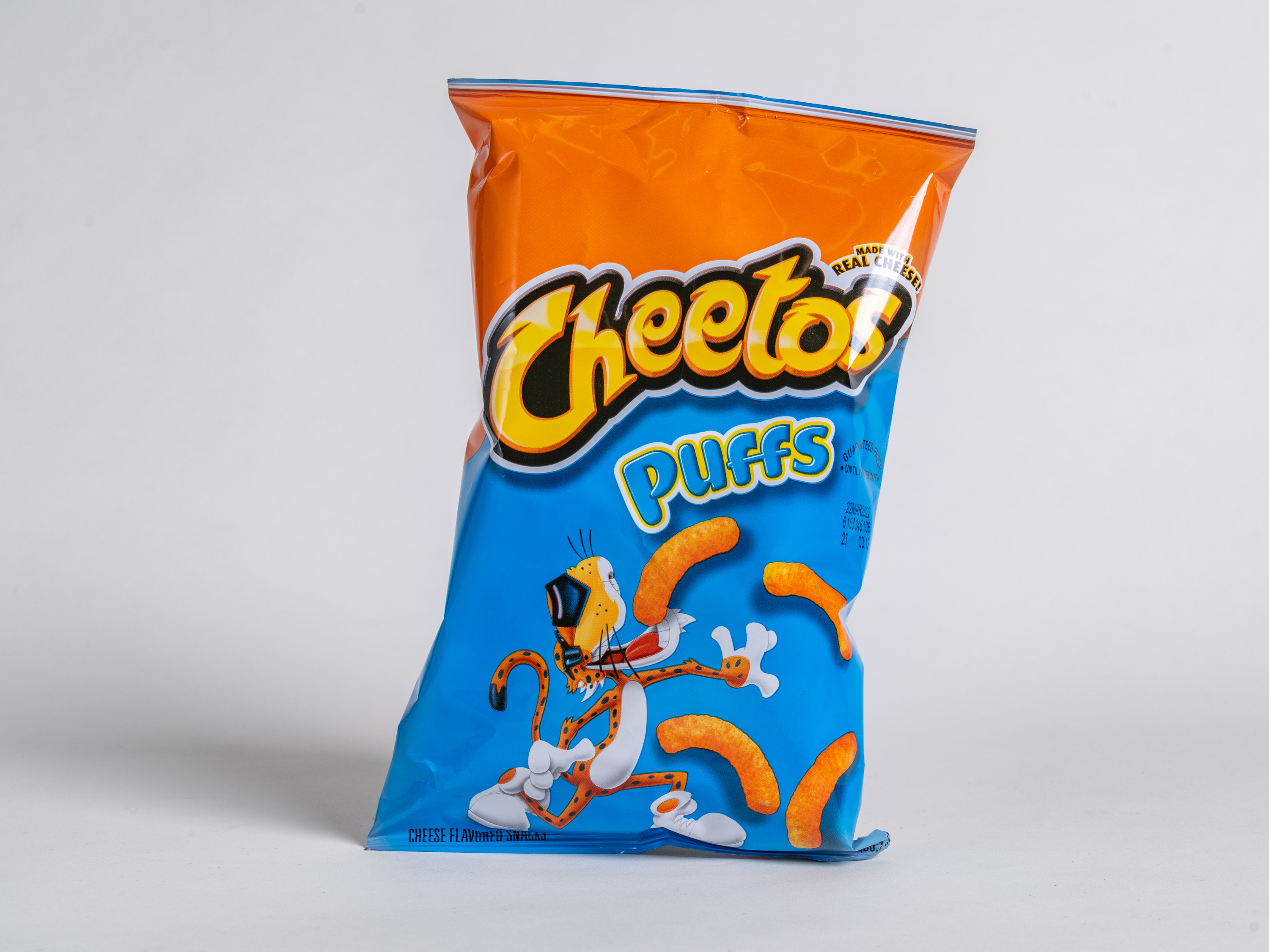 Order Cheetos Puffs food online from Kangaroo Food Mart store, Cathedral City on bringmethat.com